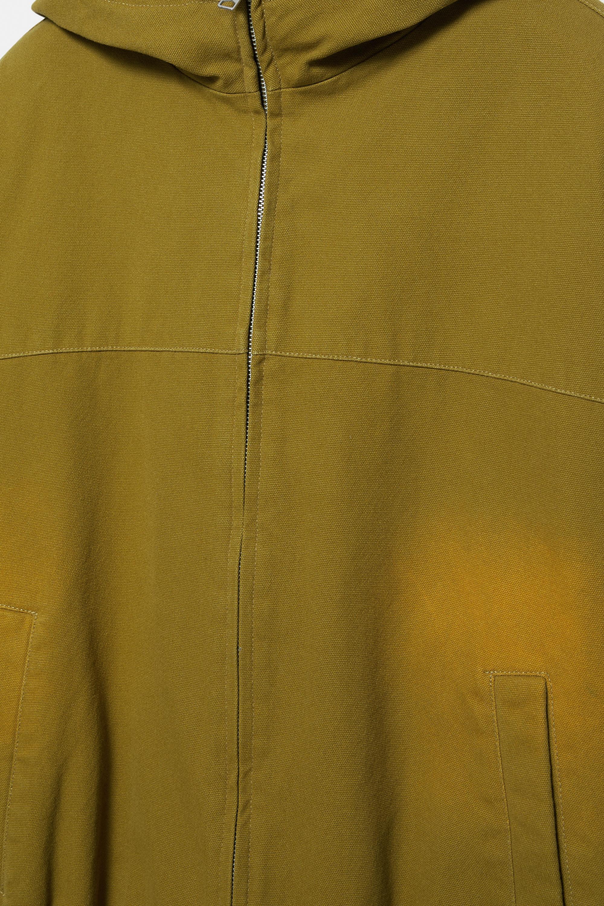 Hooded jacket with faded detail — Green