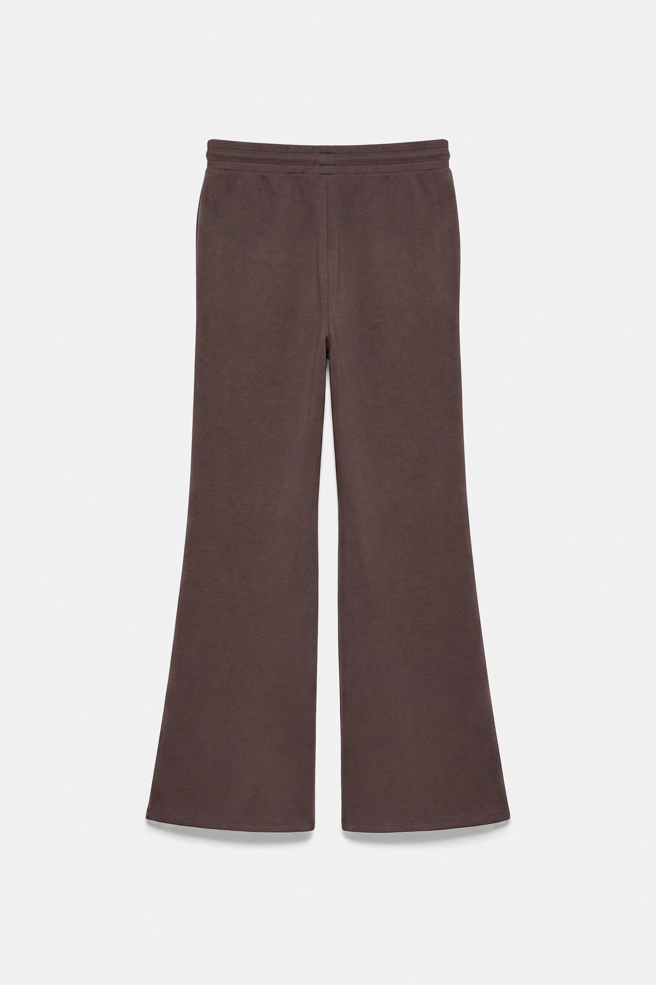 Soft-touch flared trousers — Brown