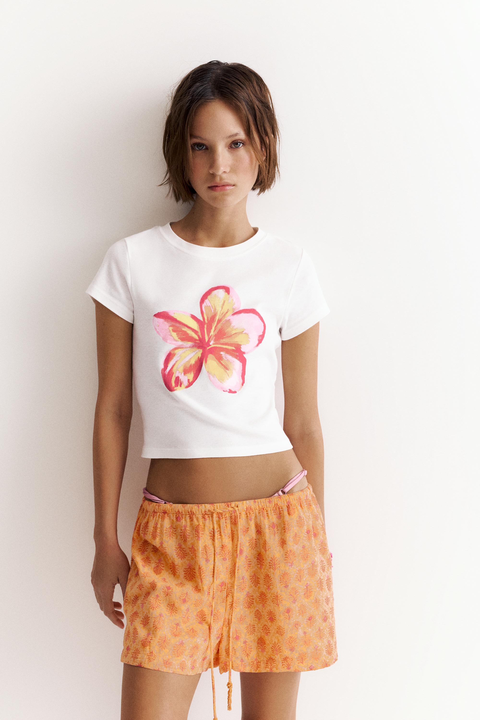 Hibiscus floral graphic T-shirt — Ice
