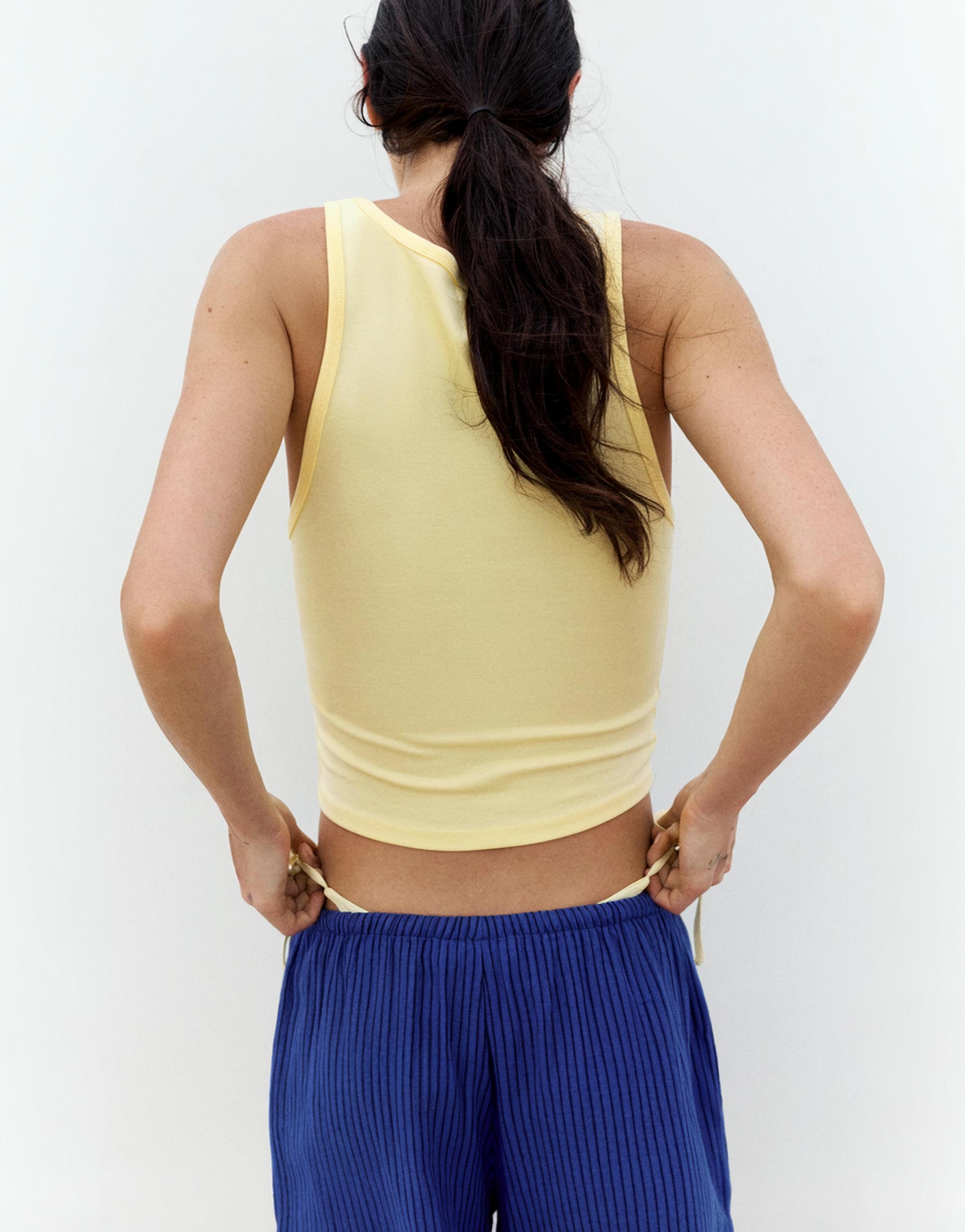 Yellow slogan tank top — Pale yellow