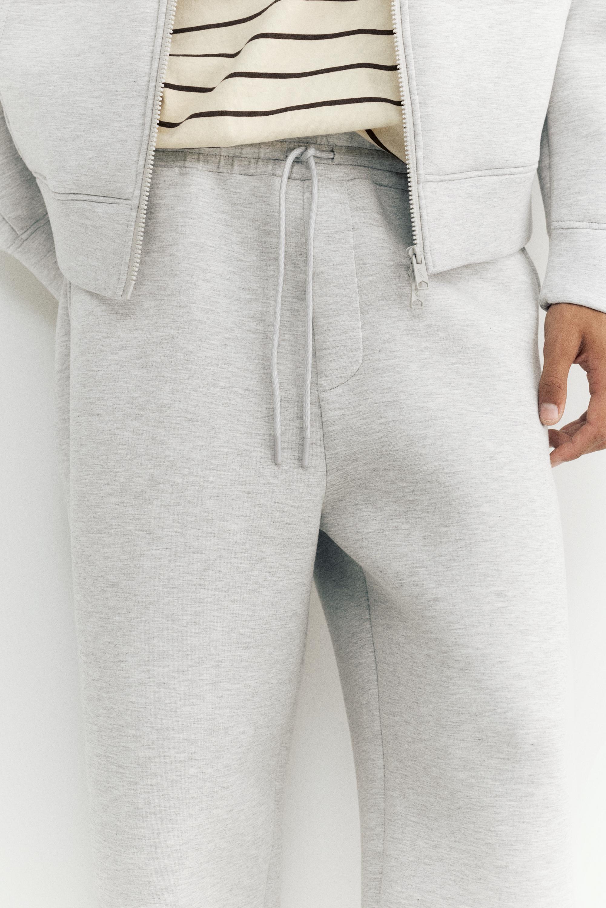 Neoprene-effect baggy trousers — Grey marl
