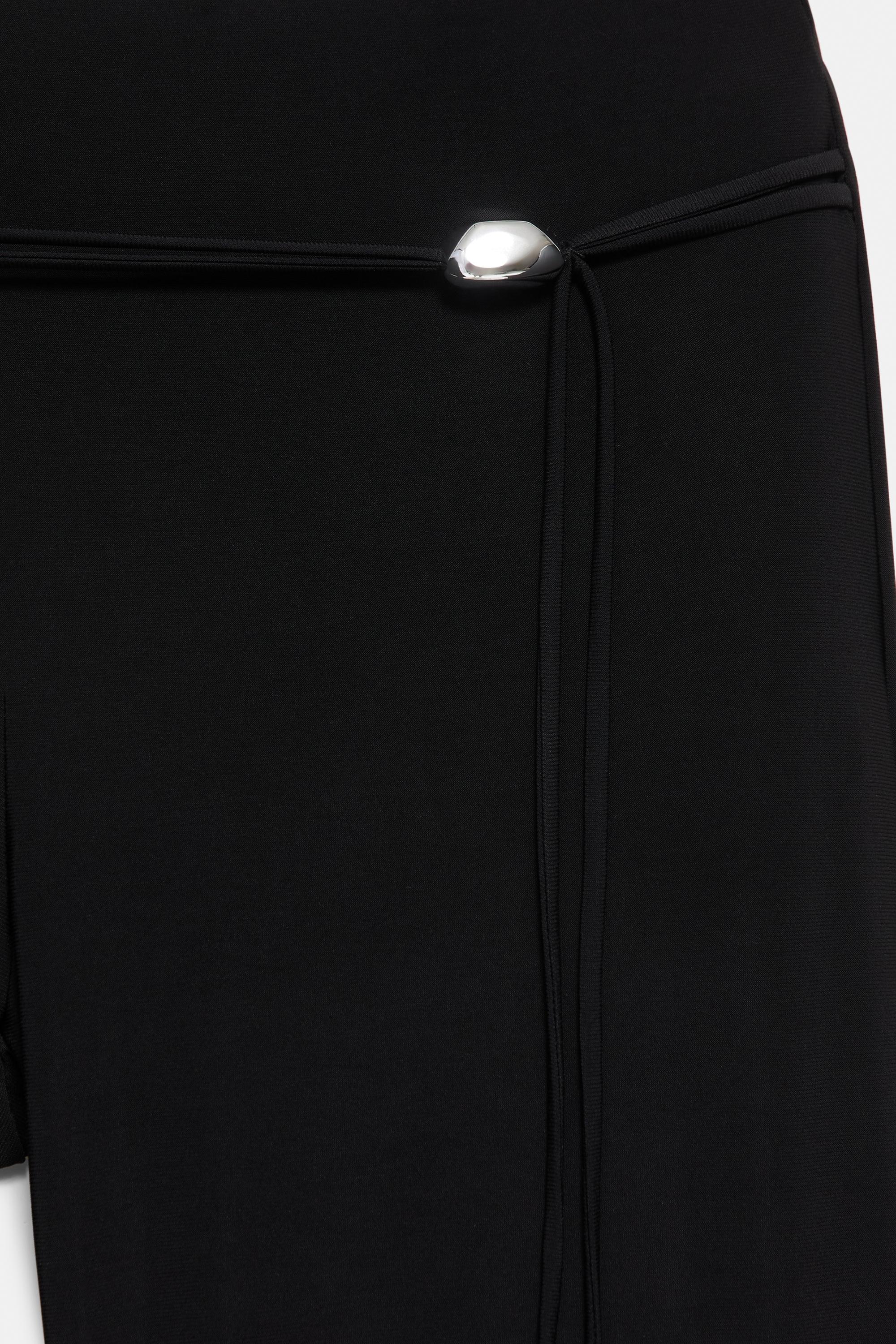 Black flared trousers — Black