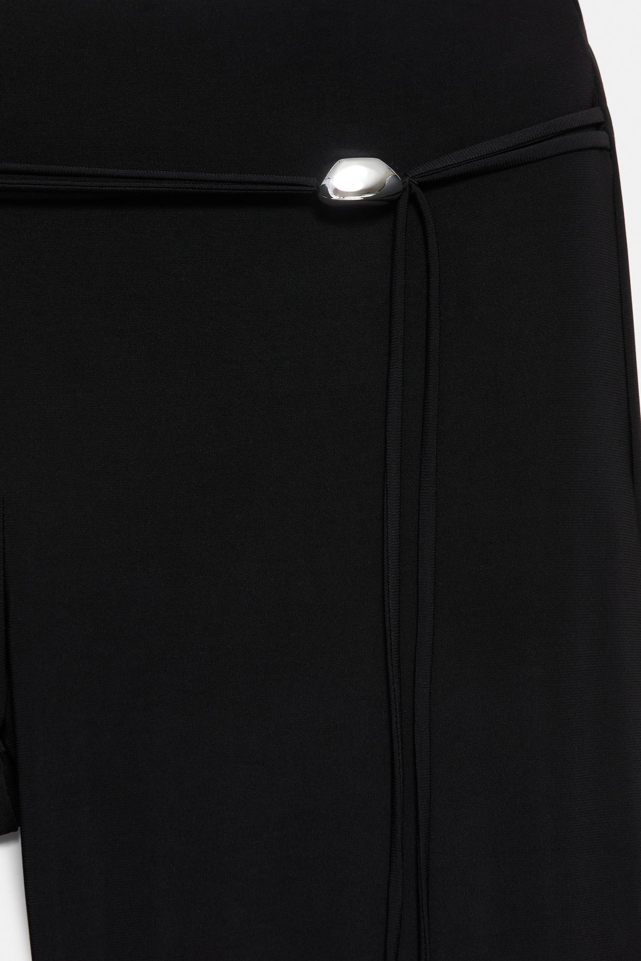 Black flared trousers — Black