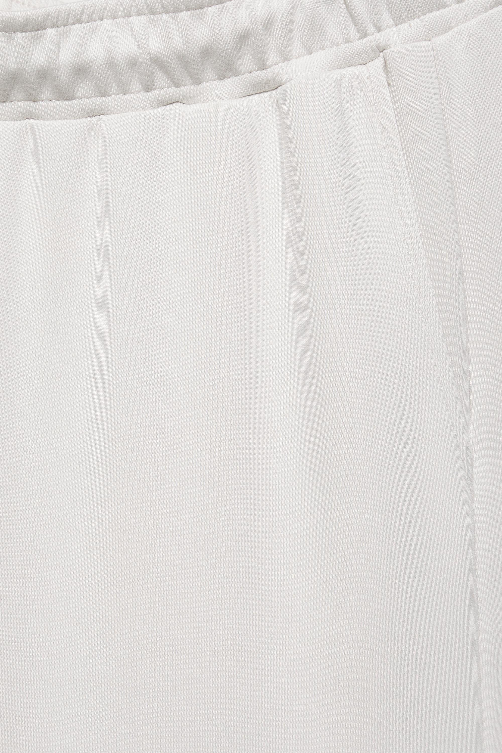 Wide-leg modal-blend trousers — Ecru