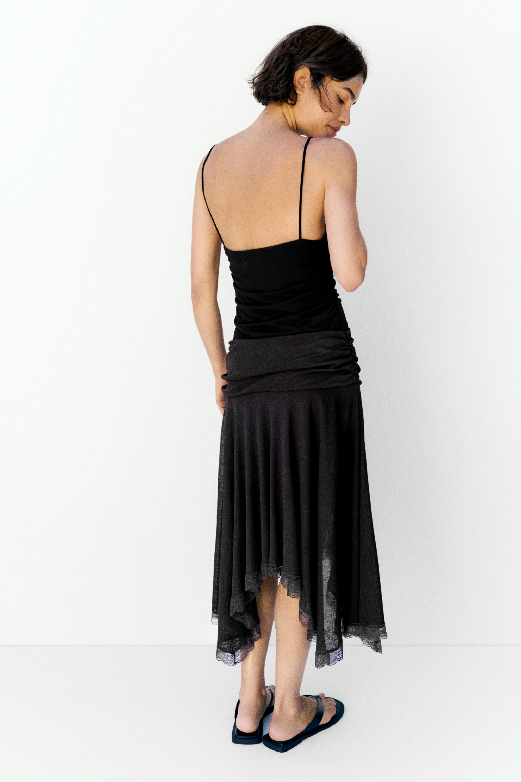 Strappy cut-out bodysuit with appliques — Black