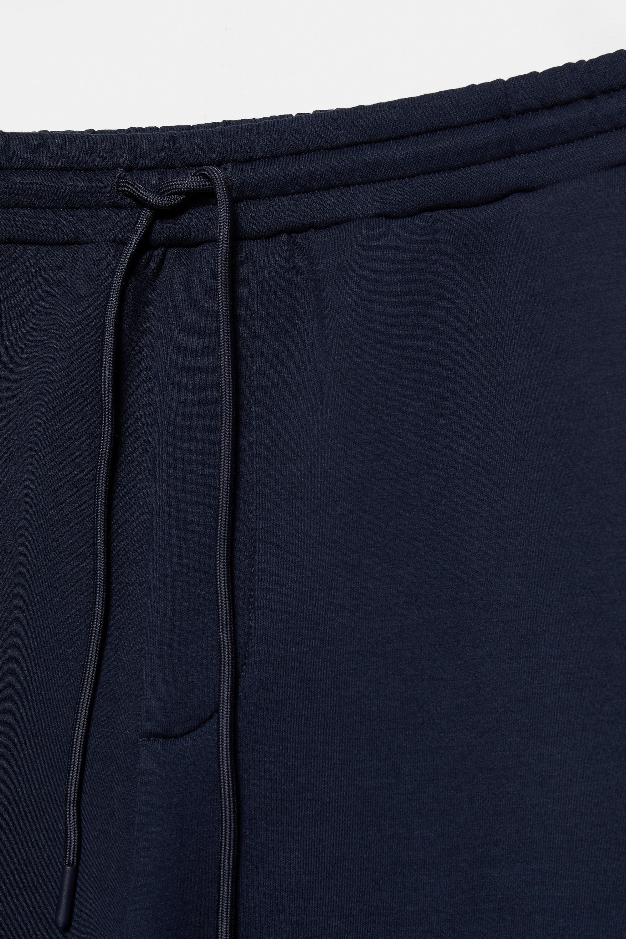 Neoprene-effect baggy trousers — Navy