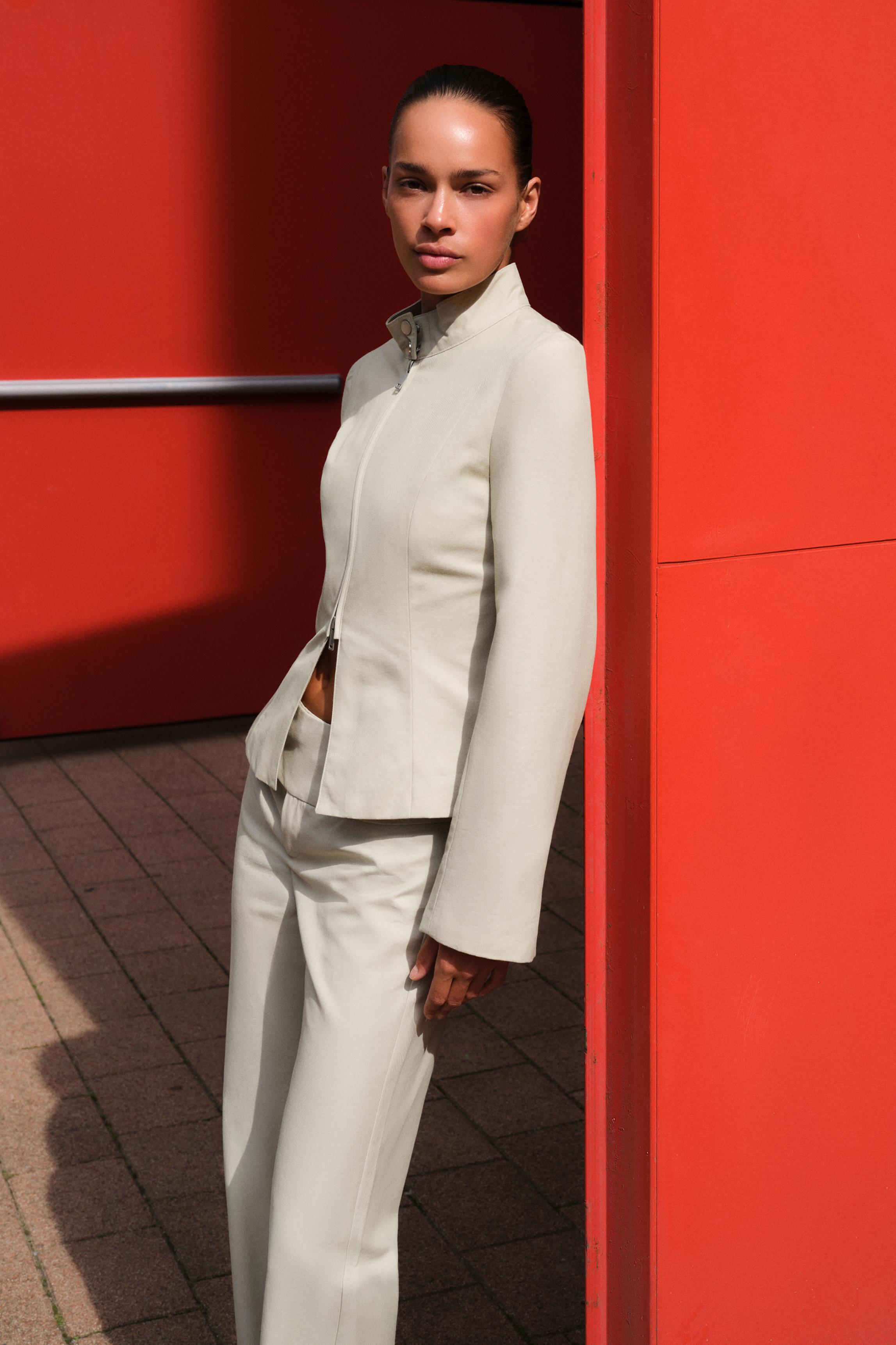 Fitted high neck jacket — Sand