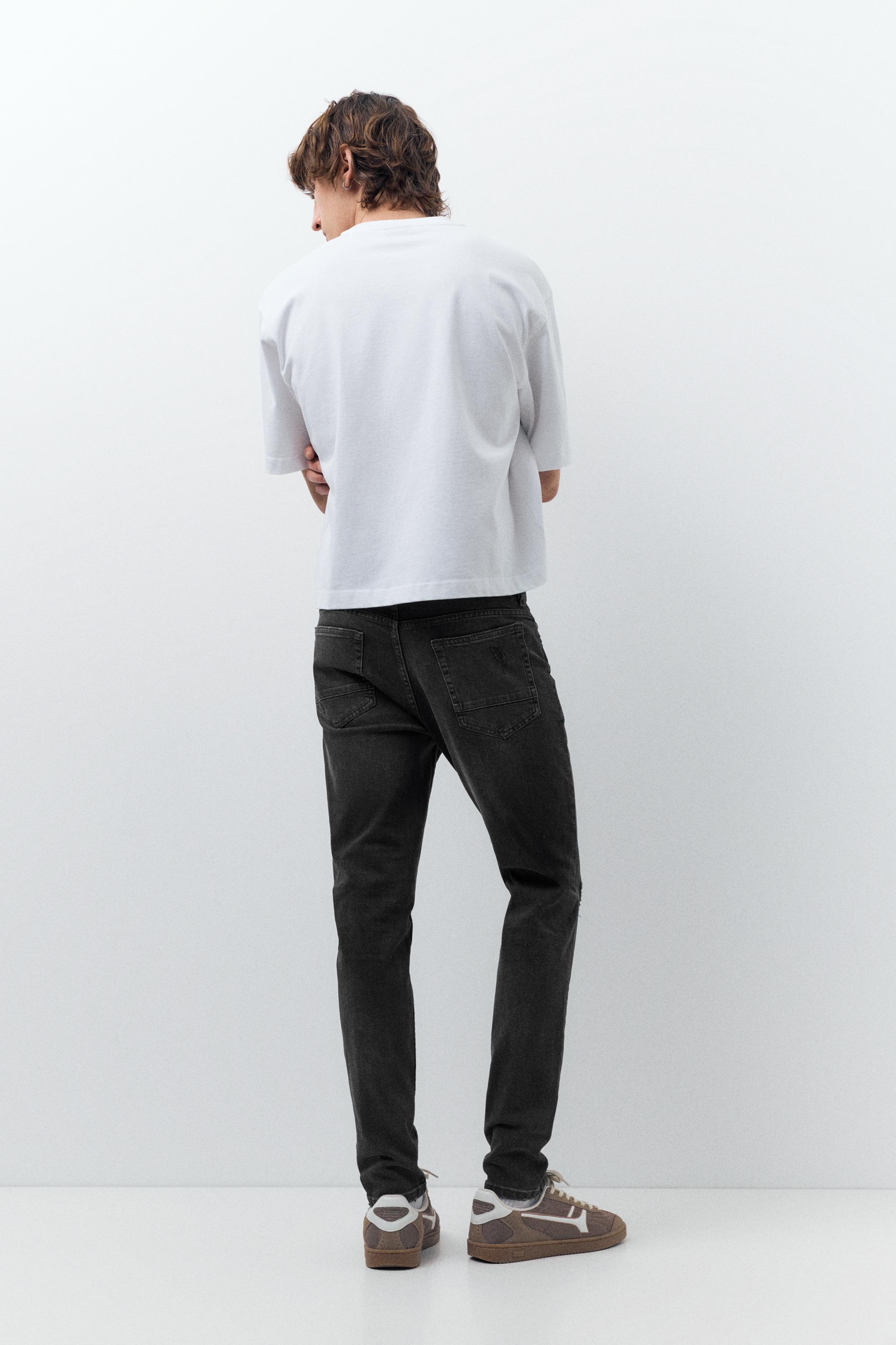 Ripped skinny jeans — Faded black