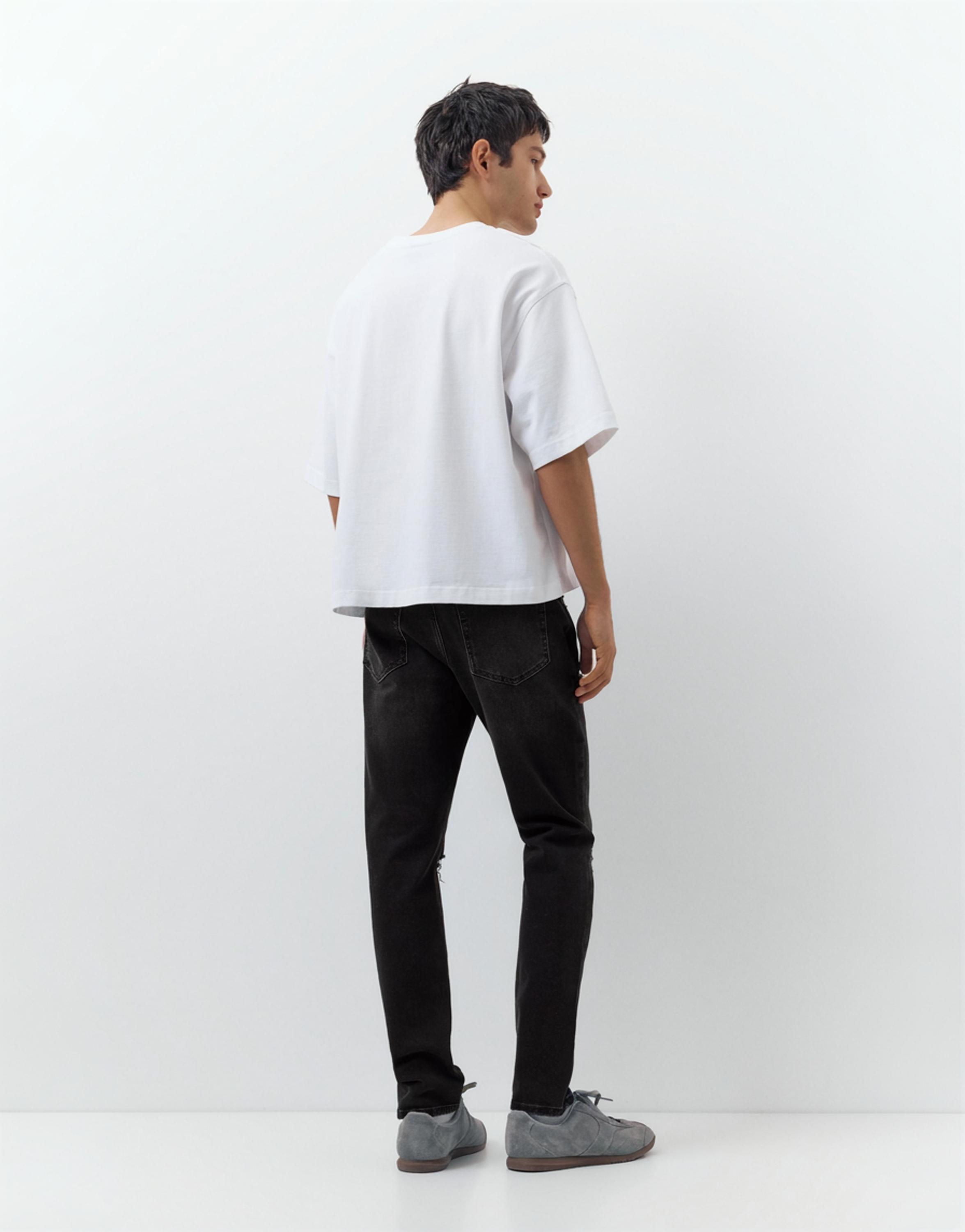 Ripped slim fit jeans — Faded black