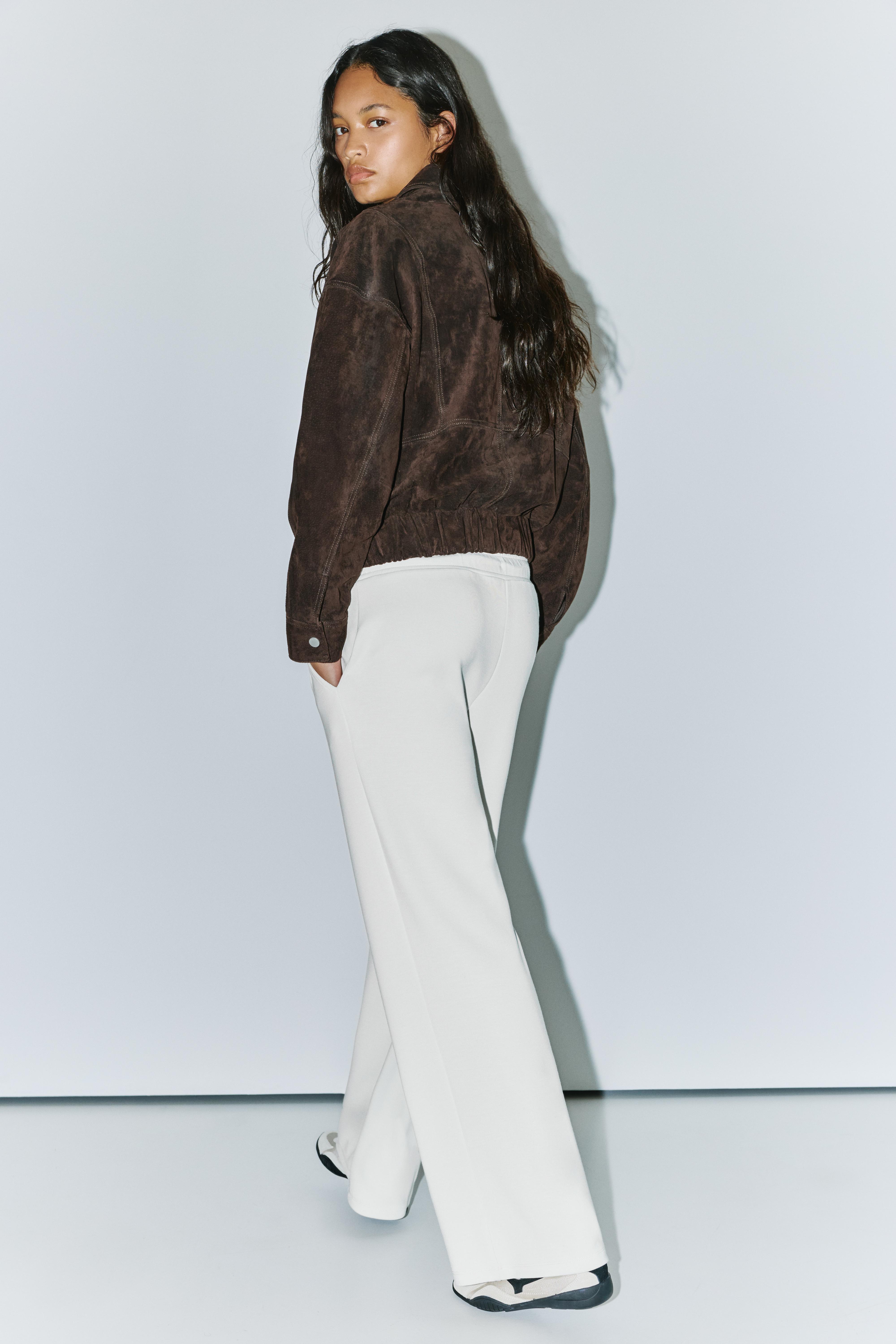 Soft-touch wide-leg trousers — Ecru