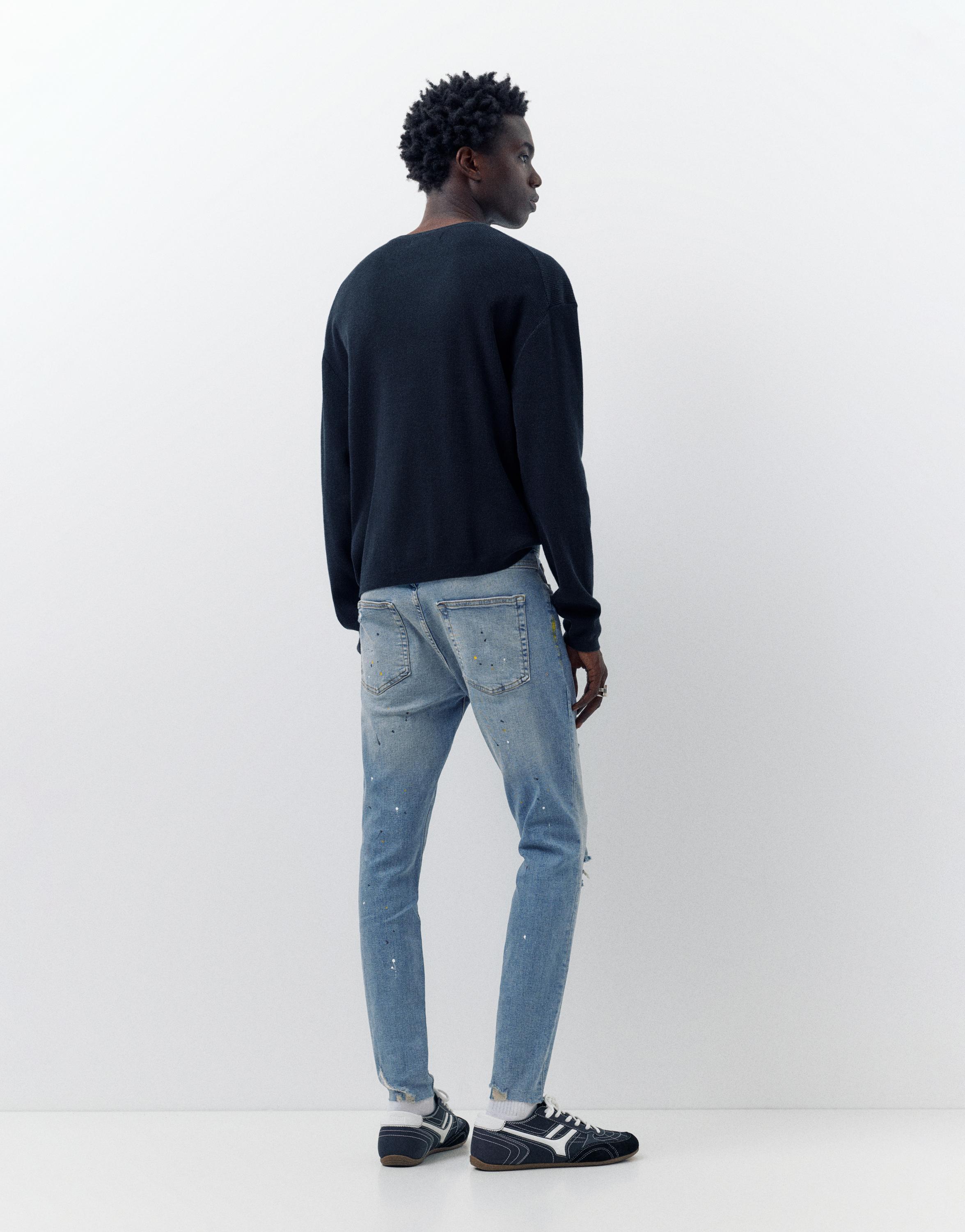Paint splatter carrot-fit jeans — Medium blue