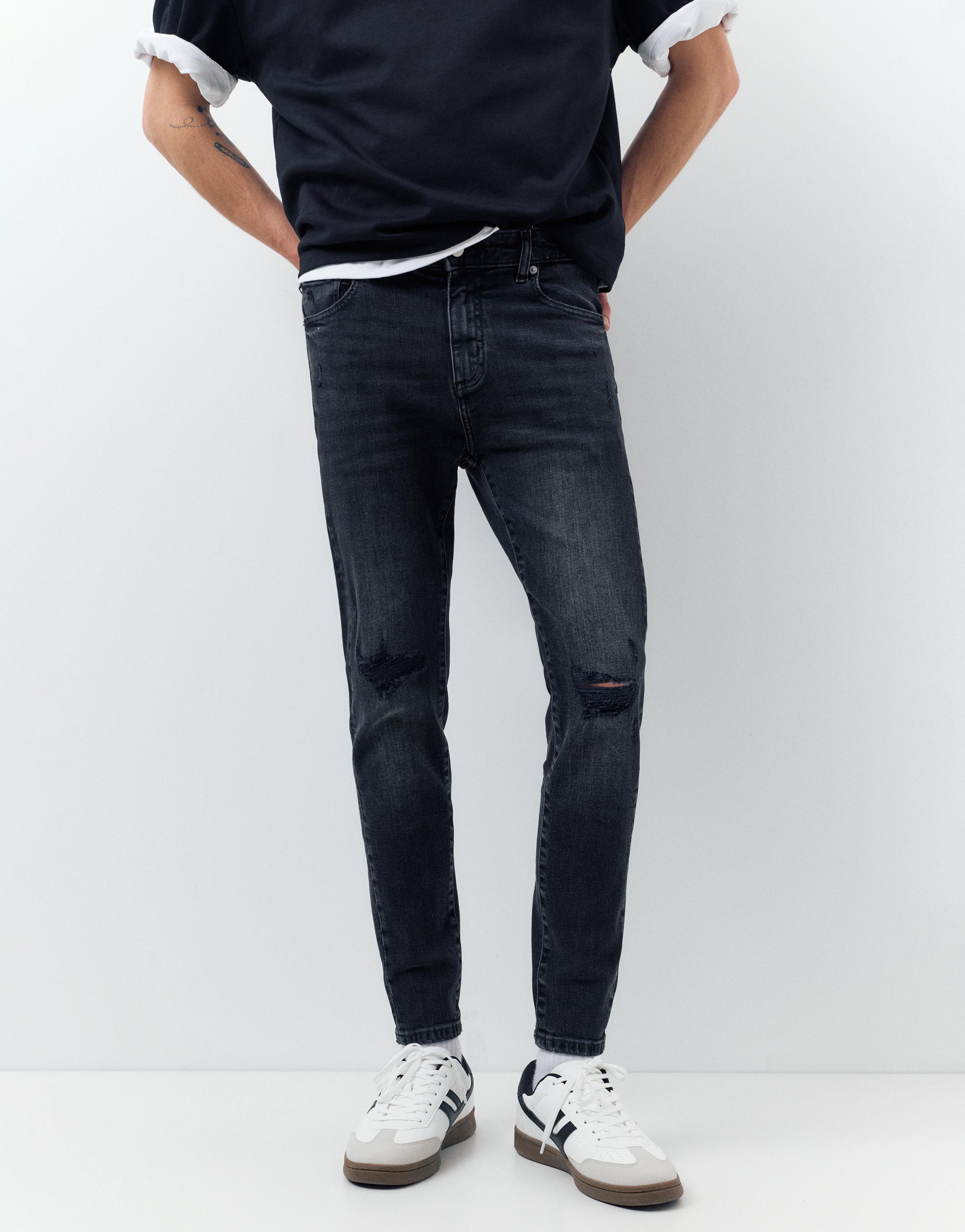 Ripped skinny jeans — Faded black