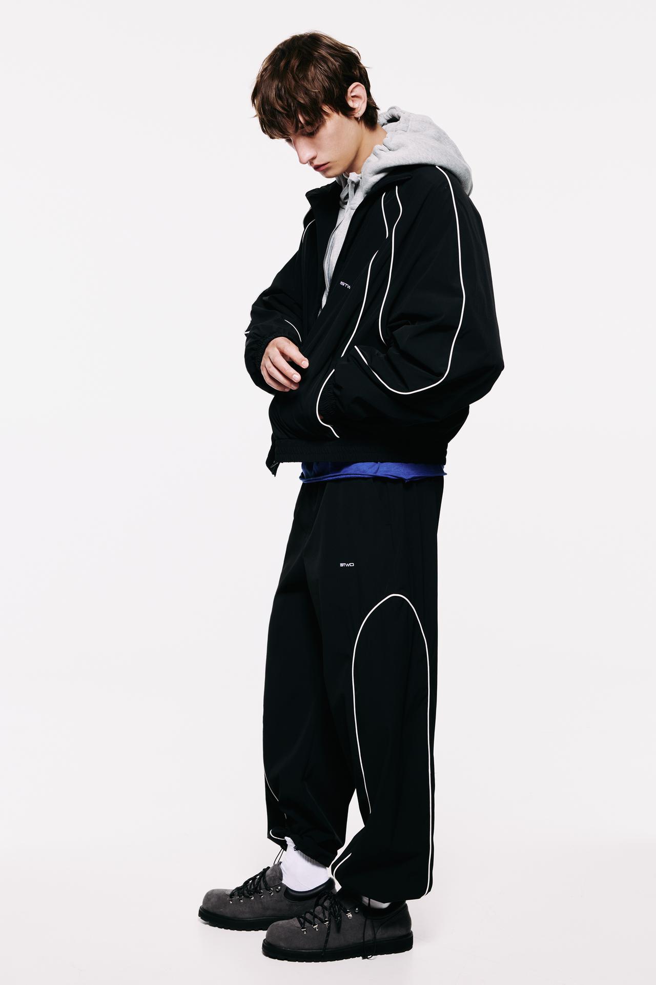 Technical jogger trousers with piping — Black