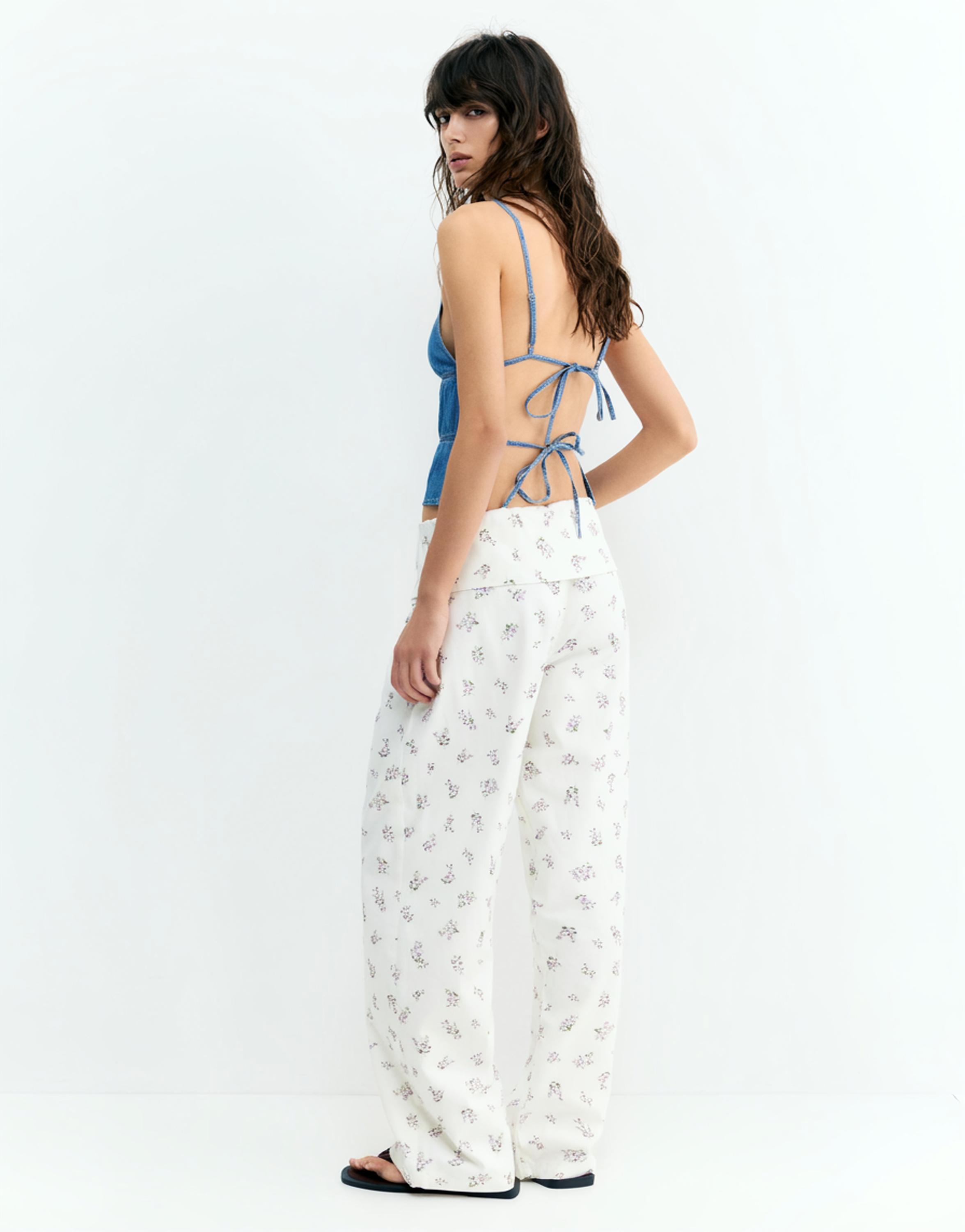 Floral trousers with turn-up waist — White