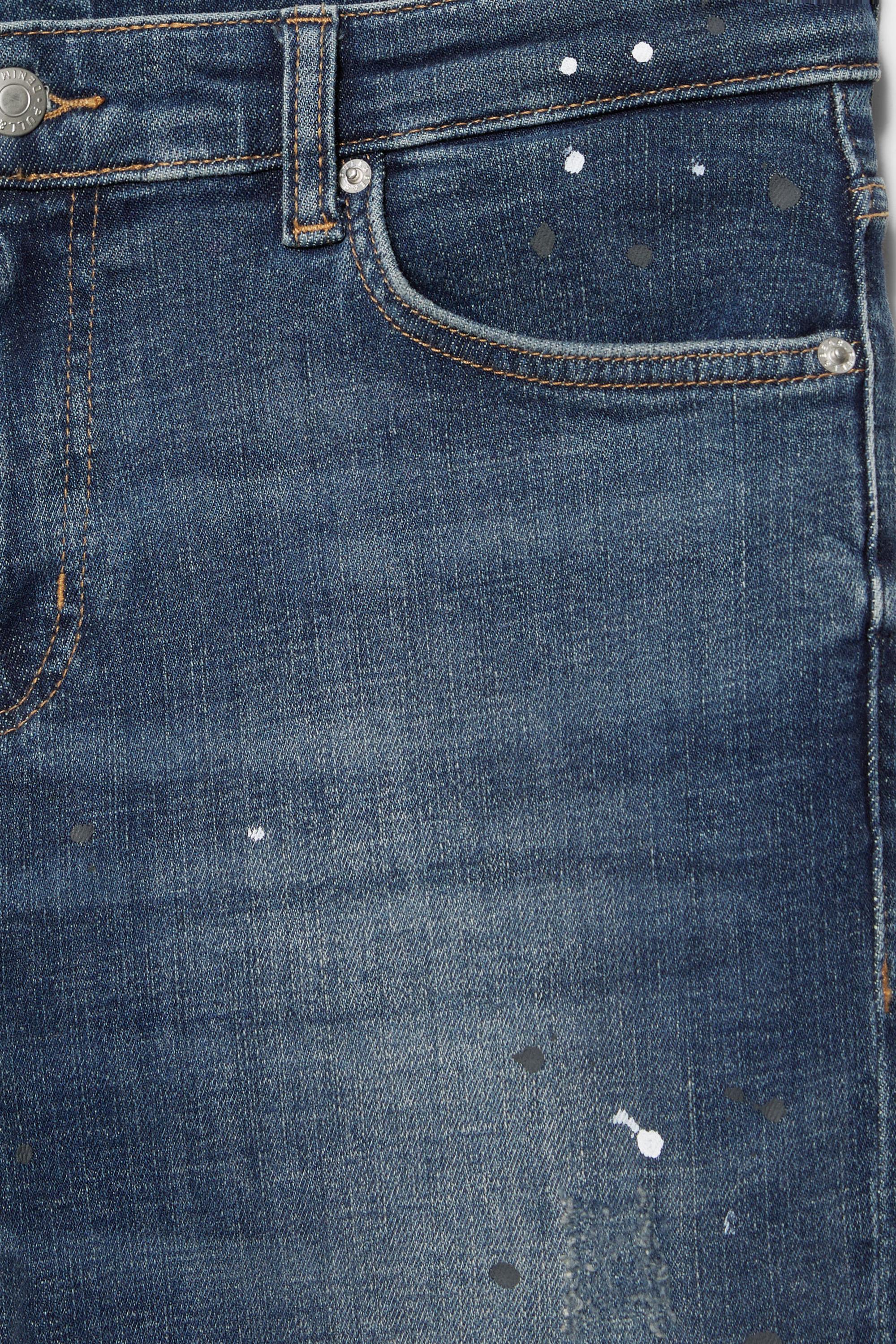 Ripped skinny jeans — Medium blue