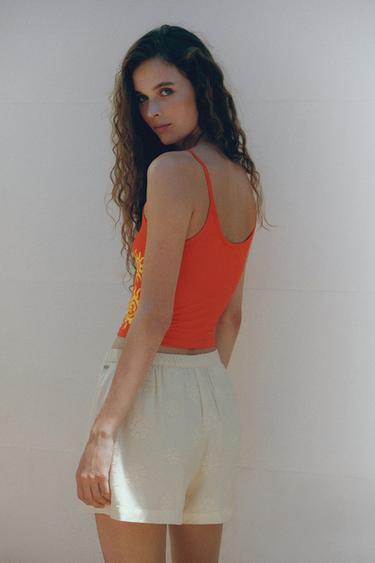 Orange sun graphic top — Red 3