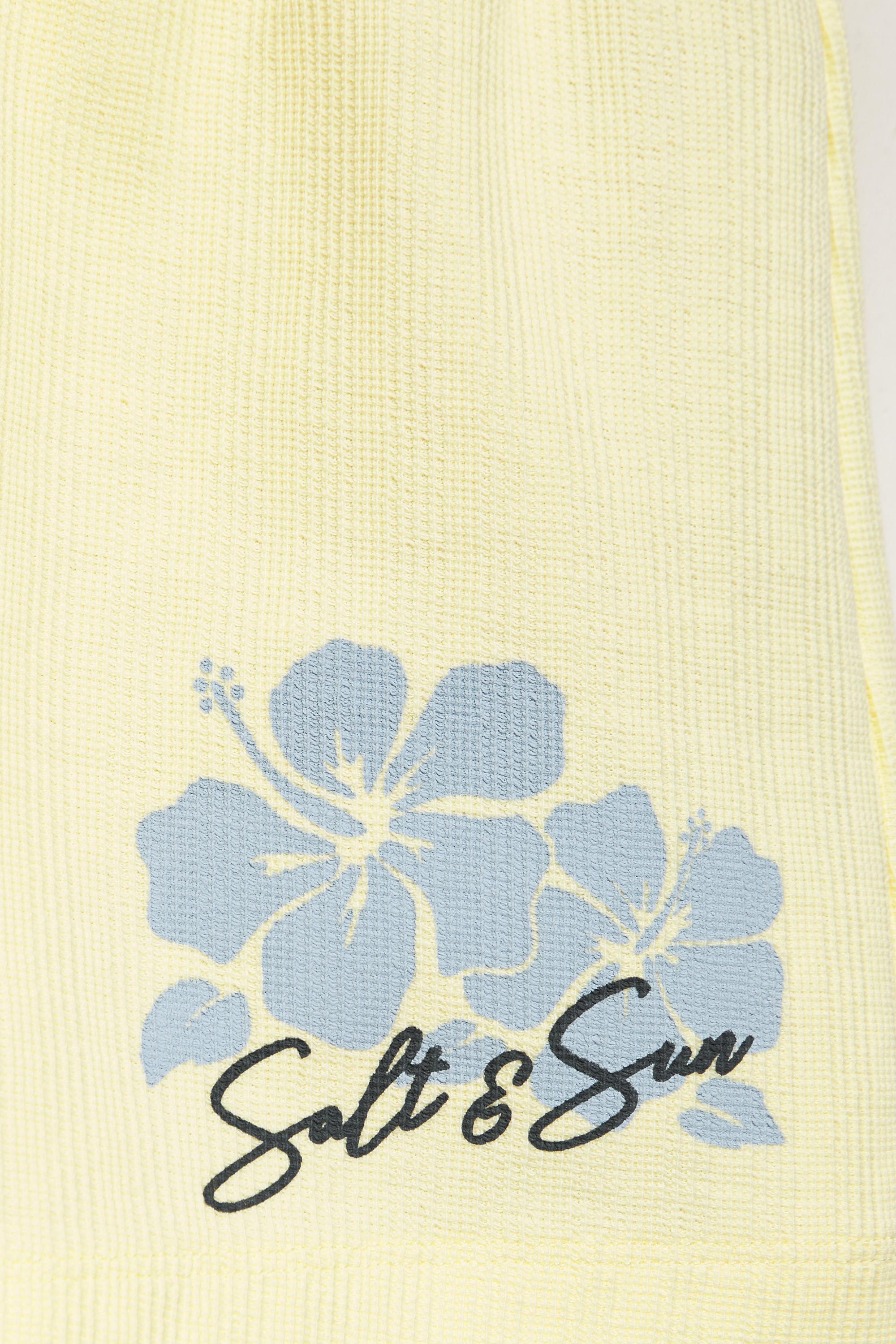 Floral textured shorts — Pale yellow