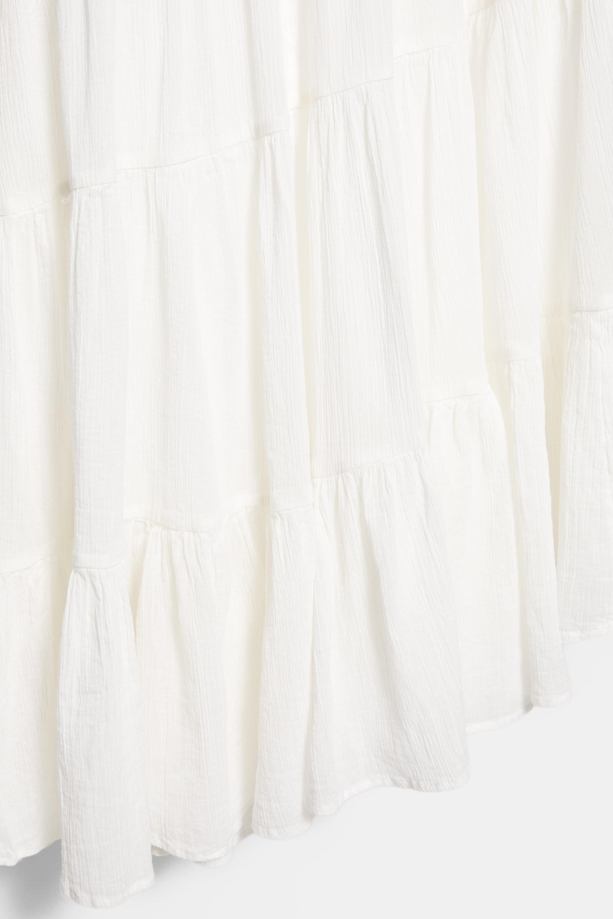 White asymmetric midi skirt — White