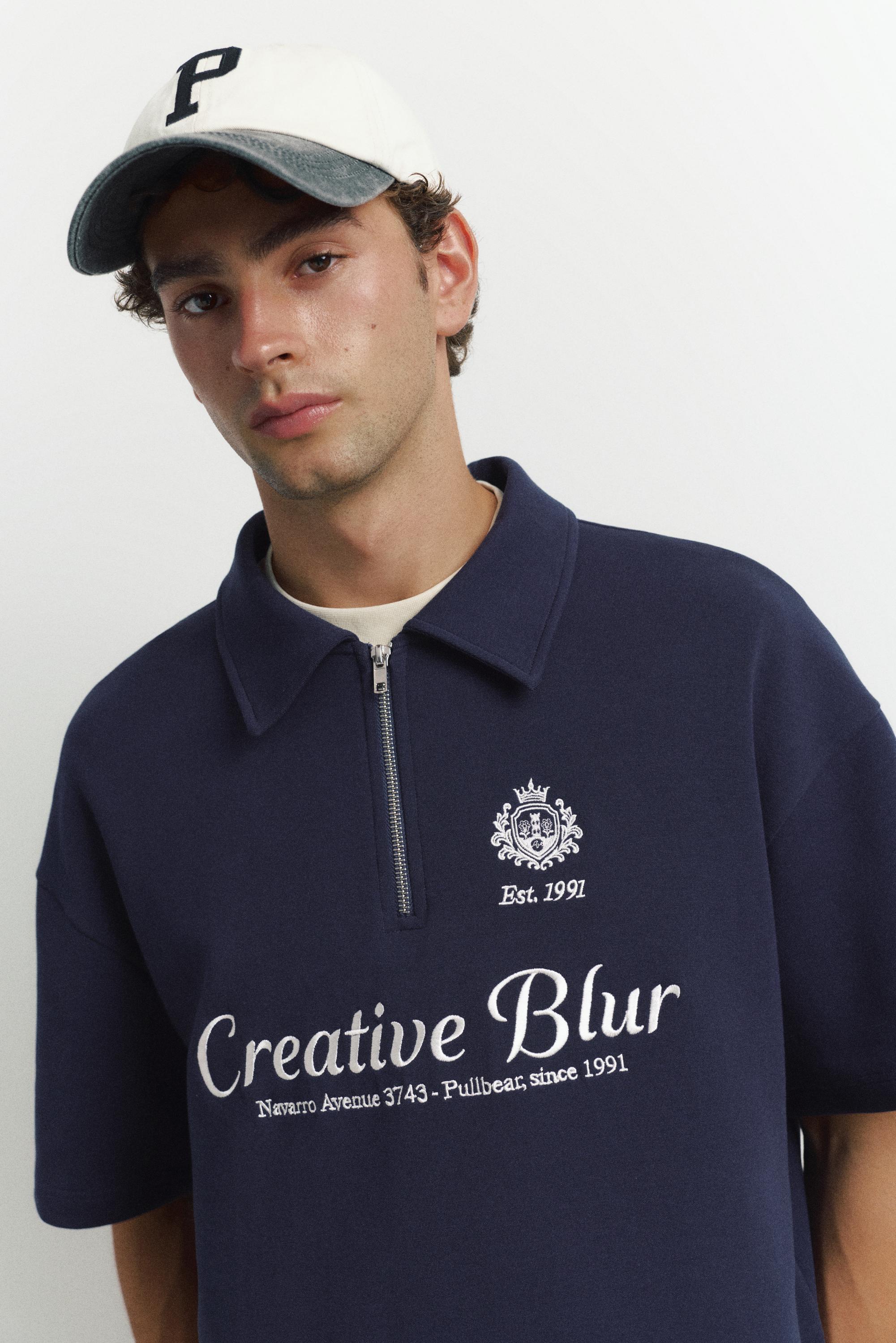 Interlock graphic polo shirt with zip — Navy