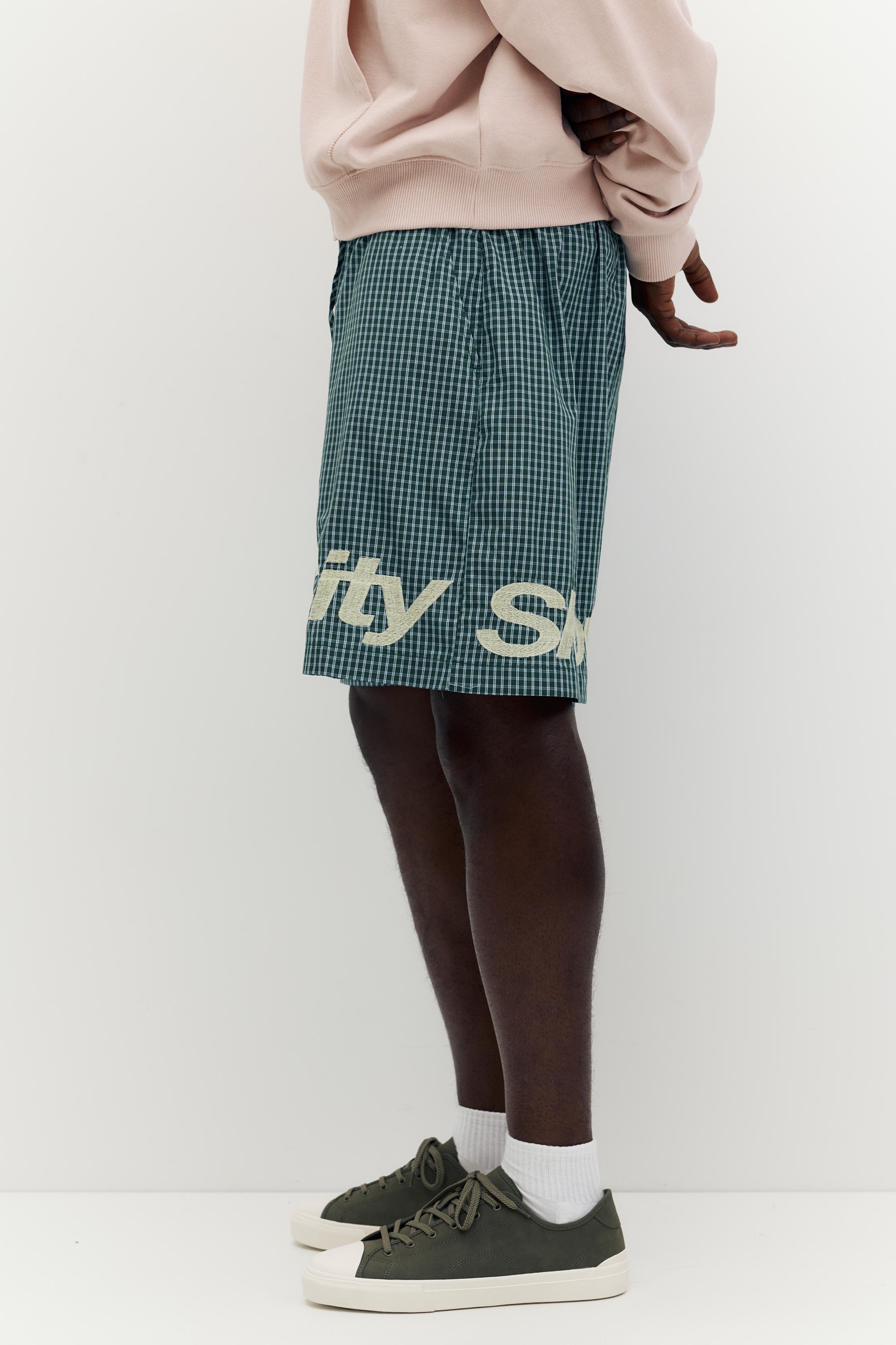 Checked graphic Bermuda shorts — Moss