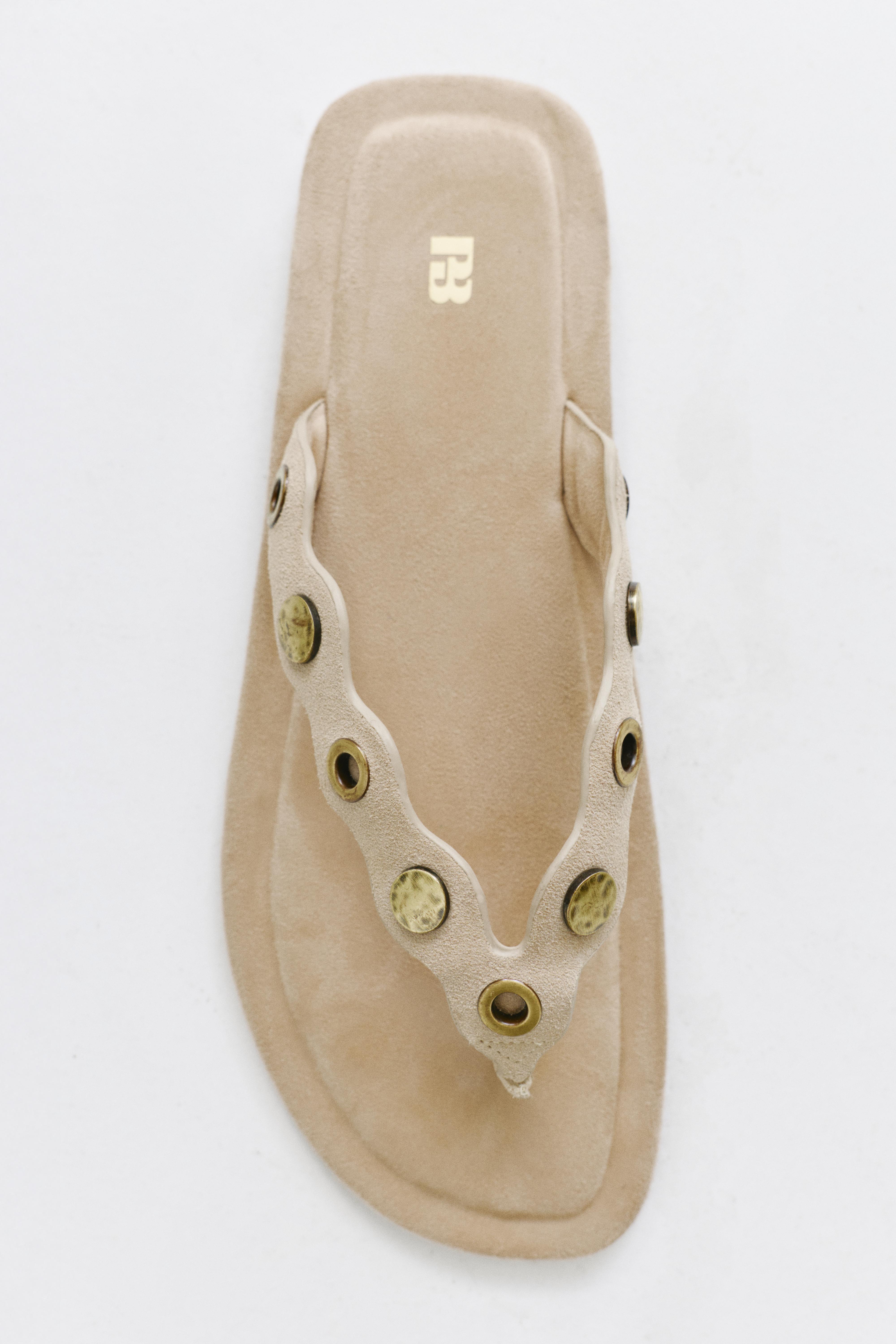 Flat studded leather sandals — Sand
