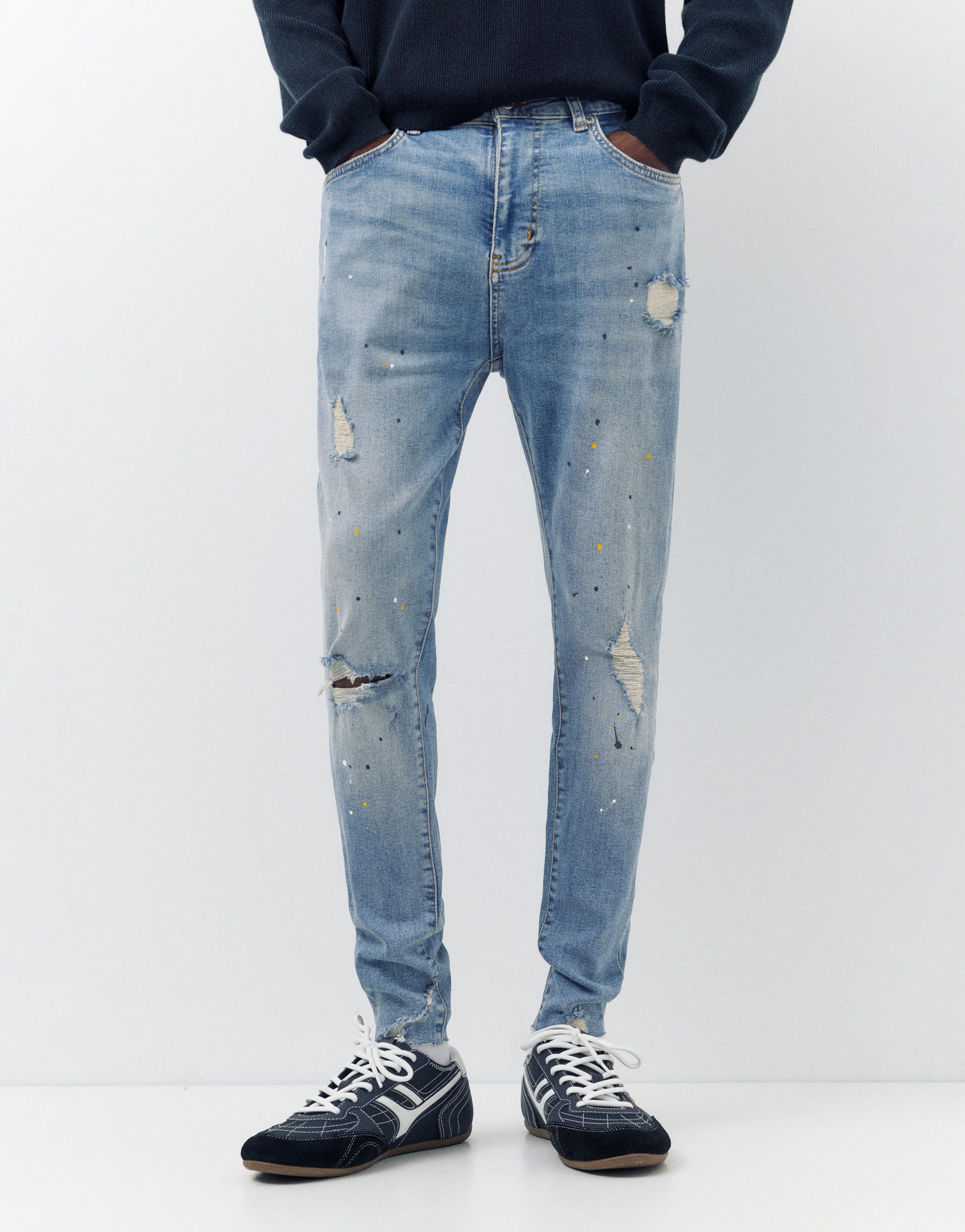Paint splatter carrot-fit jeans — Medium blue