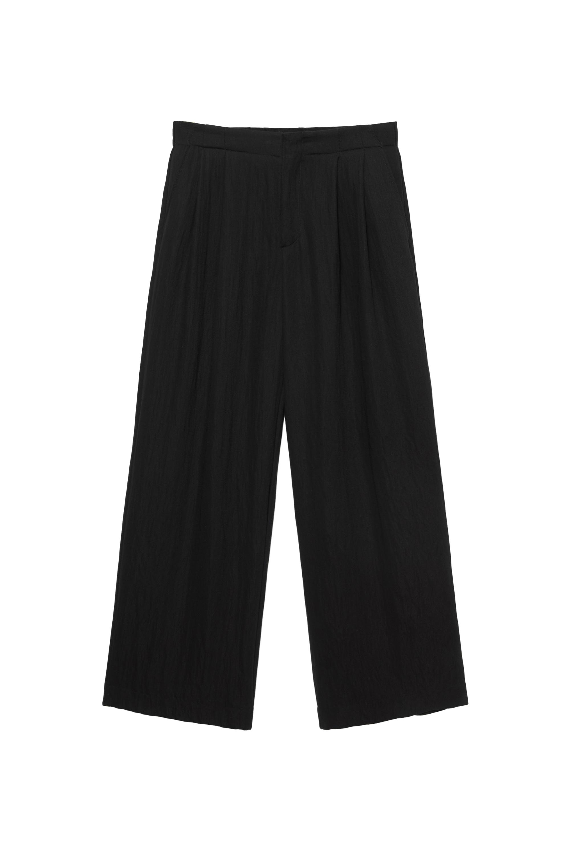 Düğmeli ve fermuarlı, kemer tokalı, önü pensli, elastik belli, tailored fit pantolon.