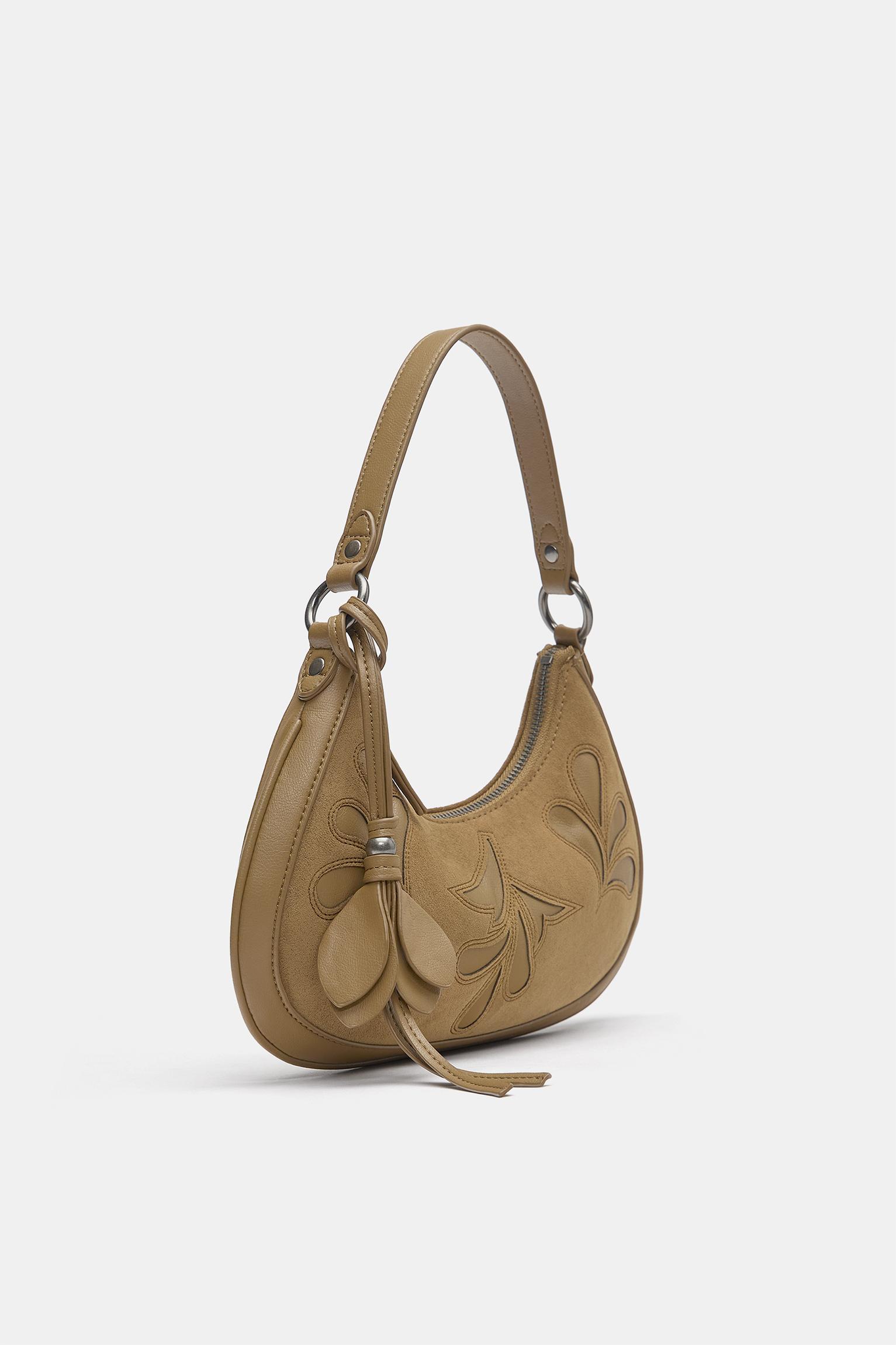 Embellished shoulder bag — Leather