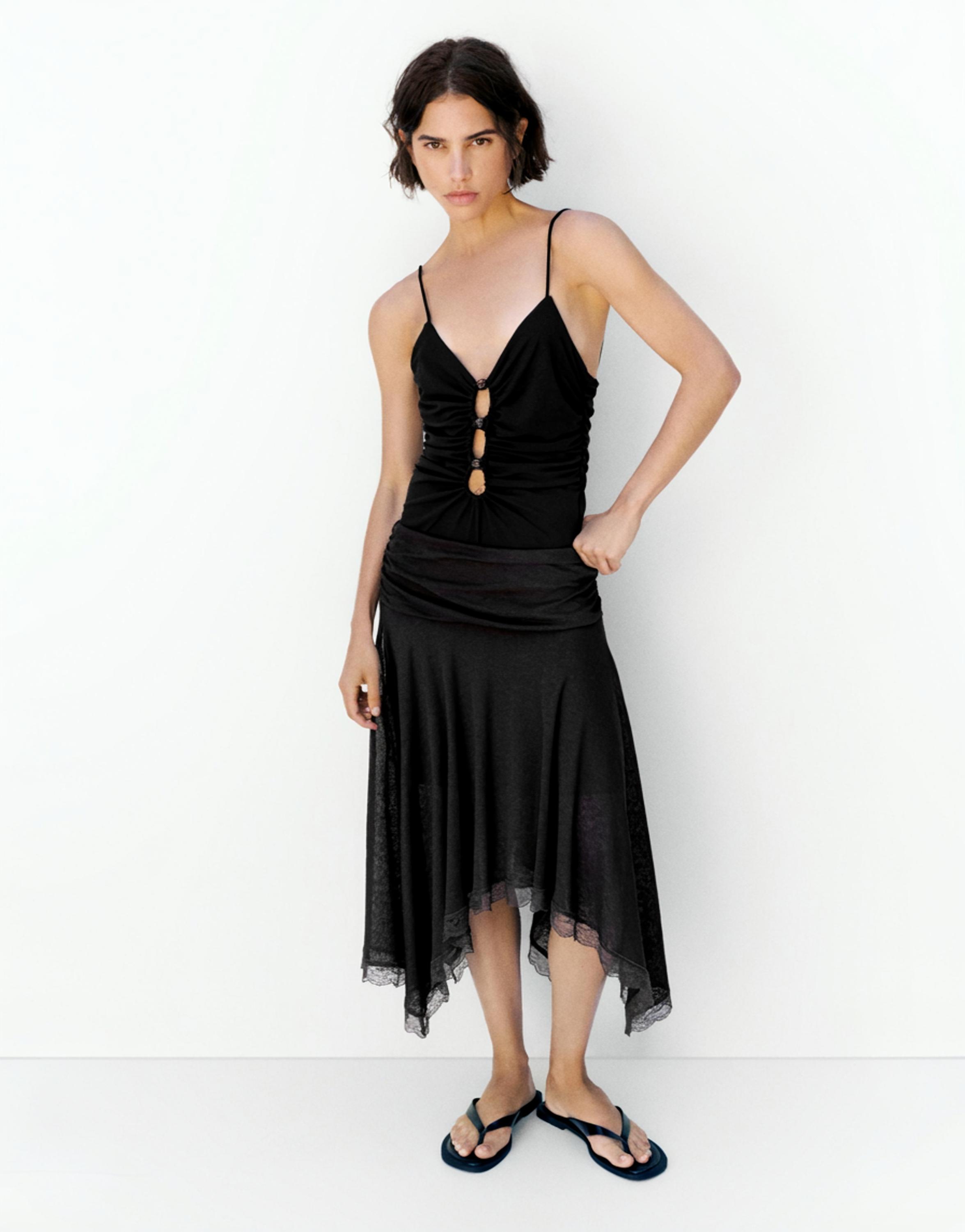 Strappy cut-out bodysuit with appliques — Black