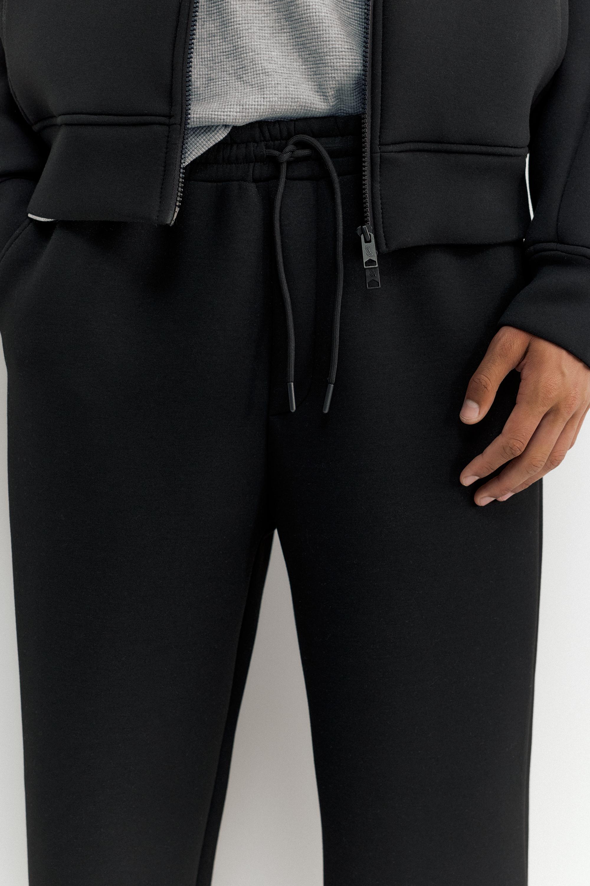 Neoprene-effect baggy trousers — Black