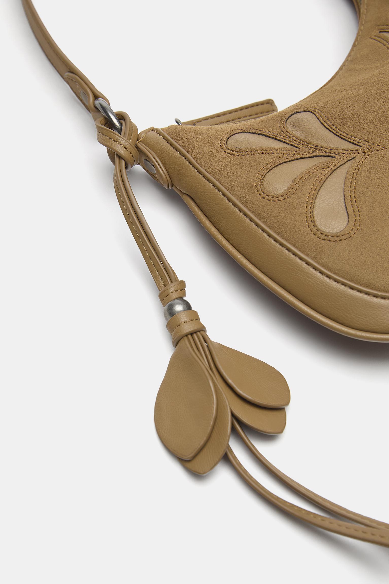 Embellished shoulder bag — Leather