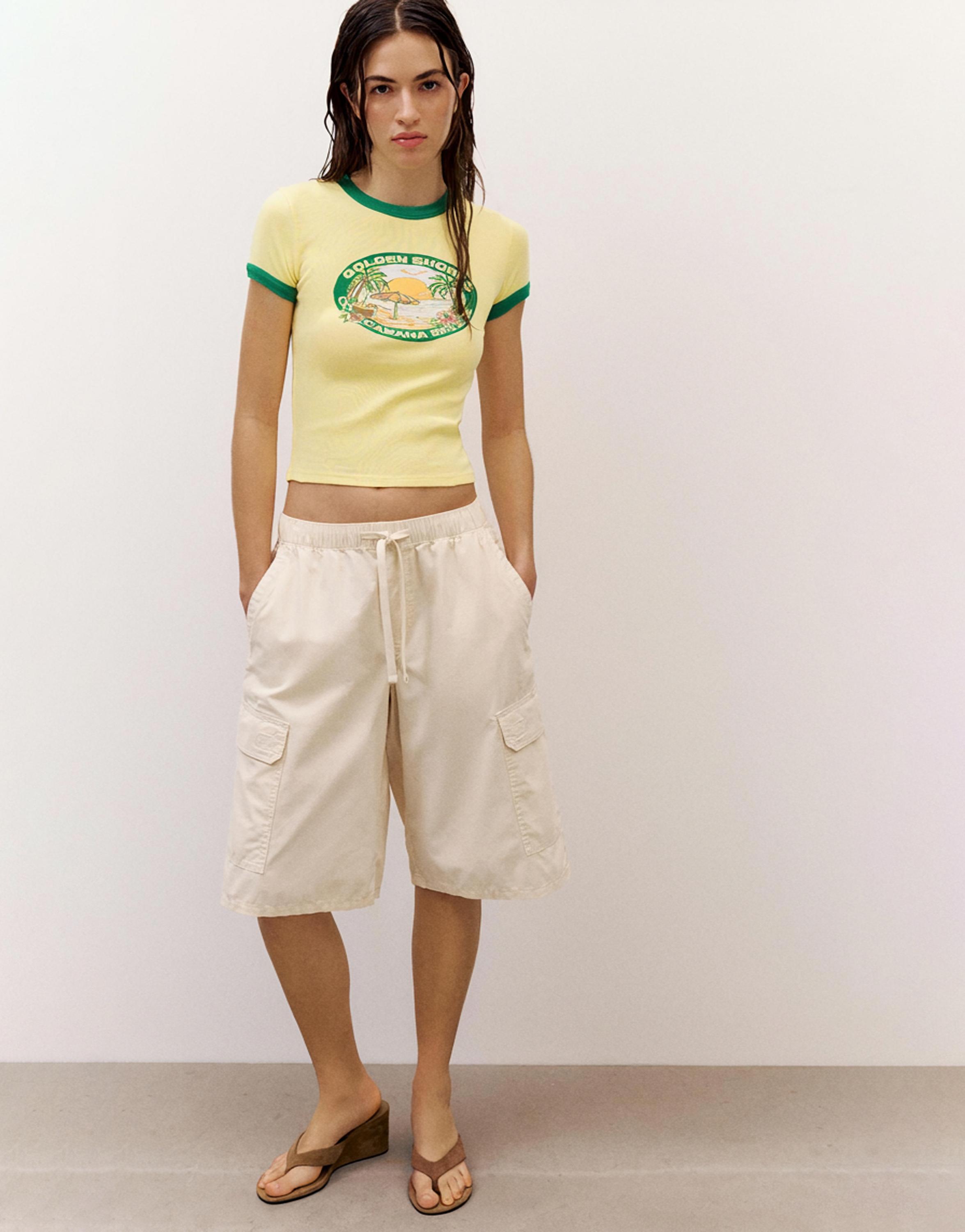 Yellow Copacabana graphic T-shirt — Yellow