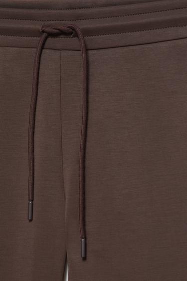 Soft-touch flared trousers — Brown 6