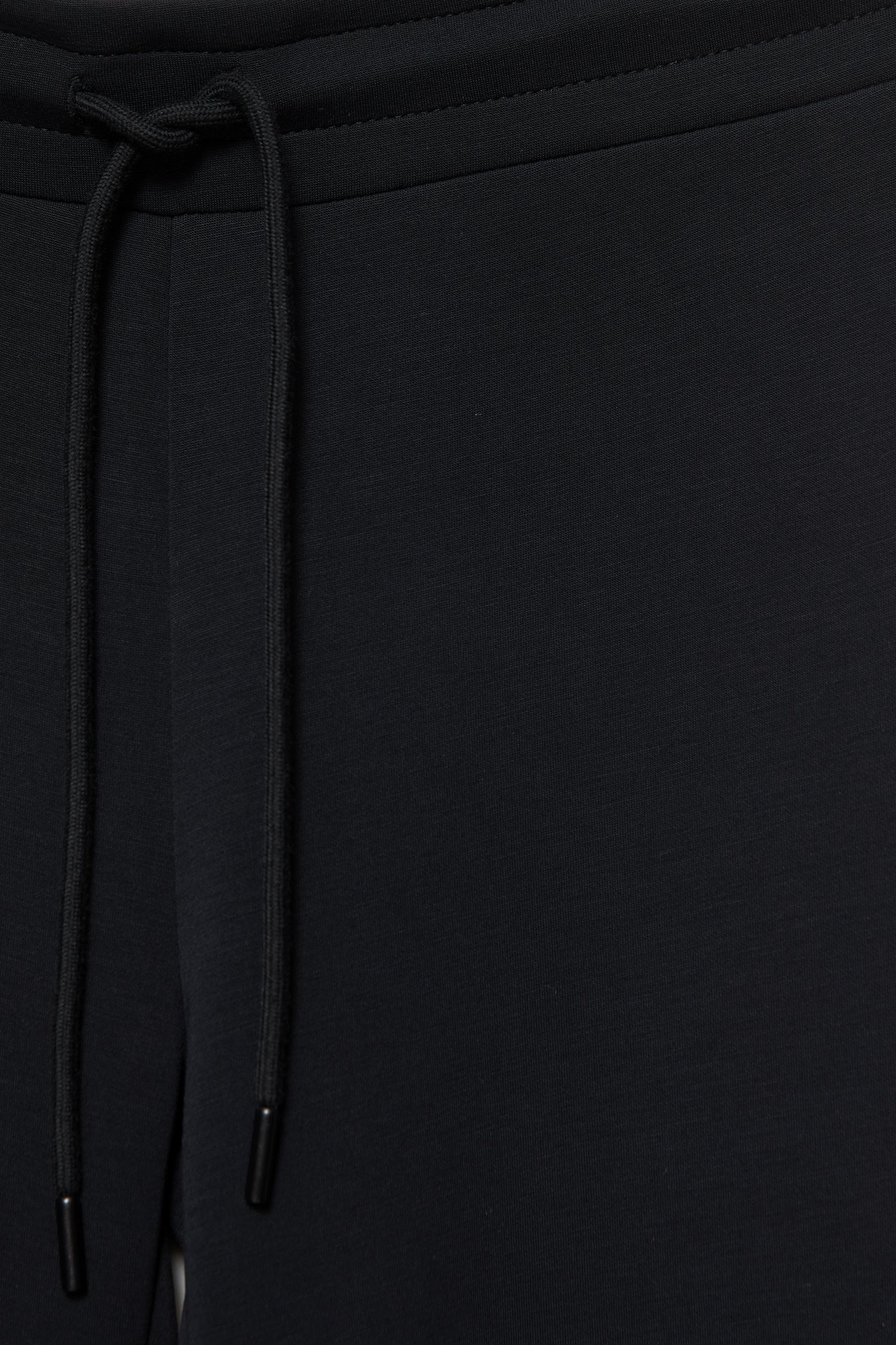 Modal flared trousers — Black