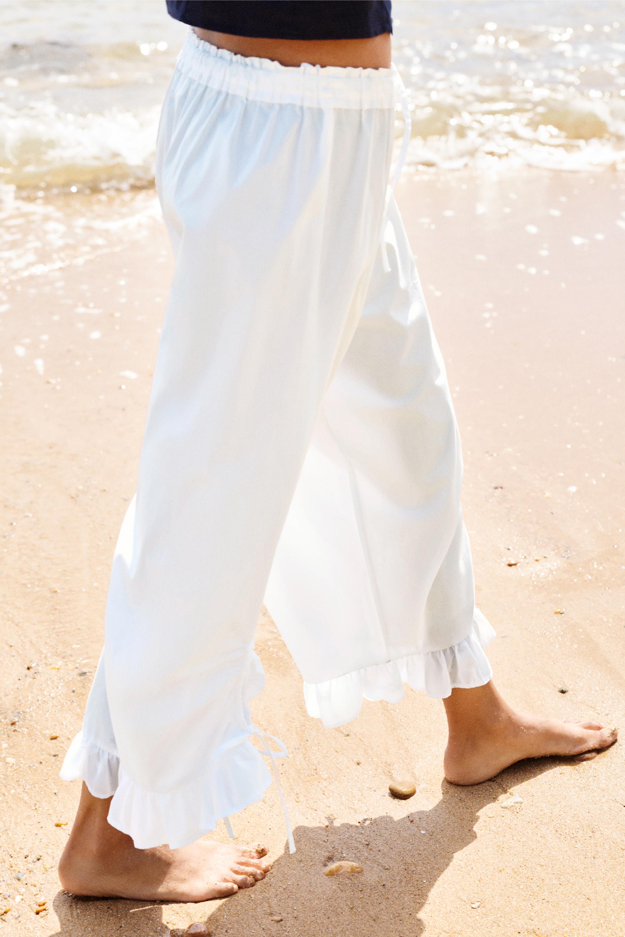 Ruffle bow sarouel trousers — White
