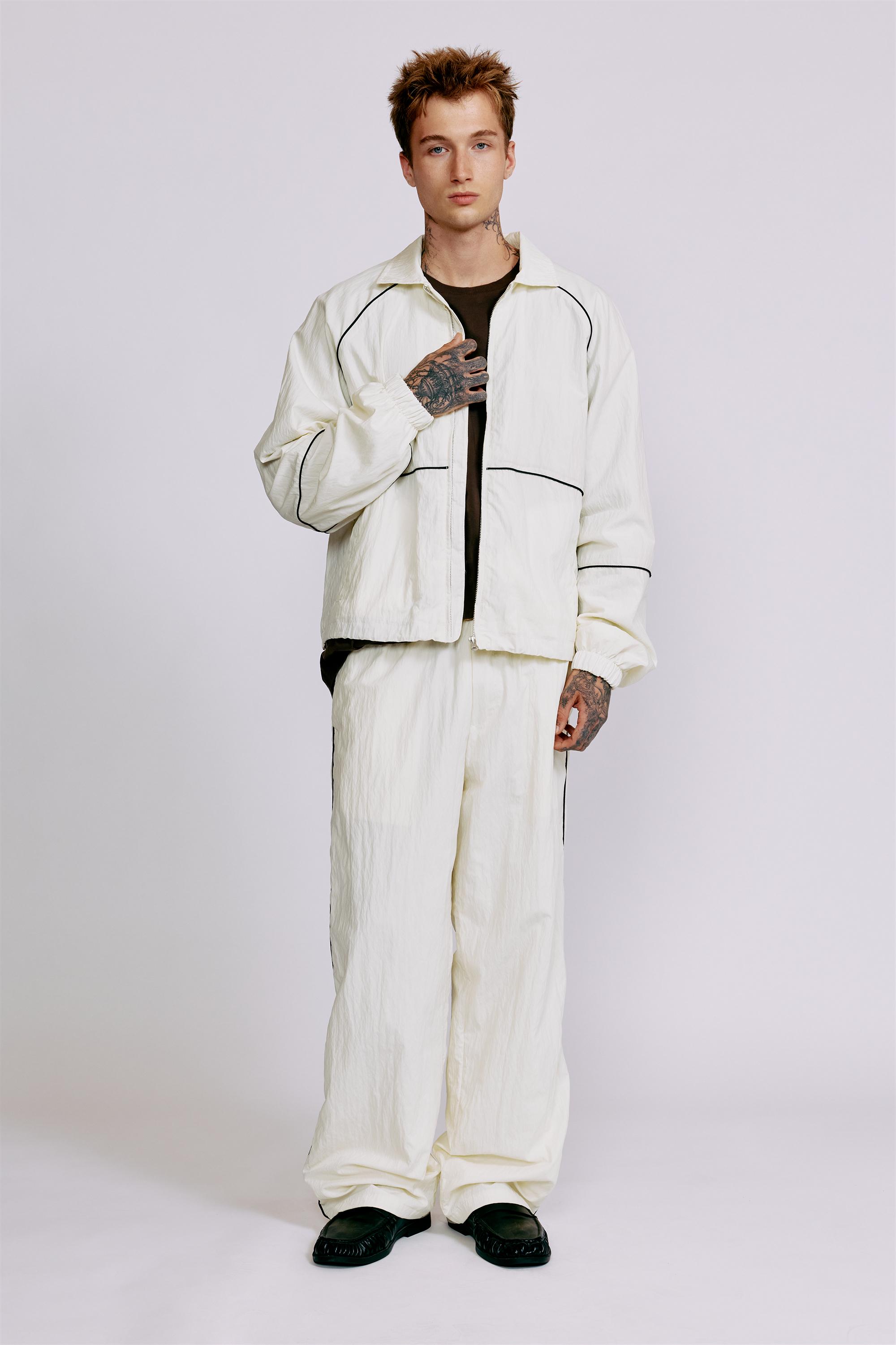 Lightweight contrast stitch joggers — Off white