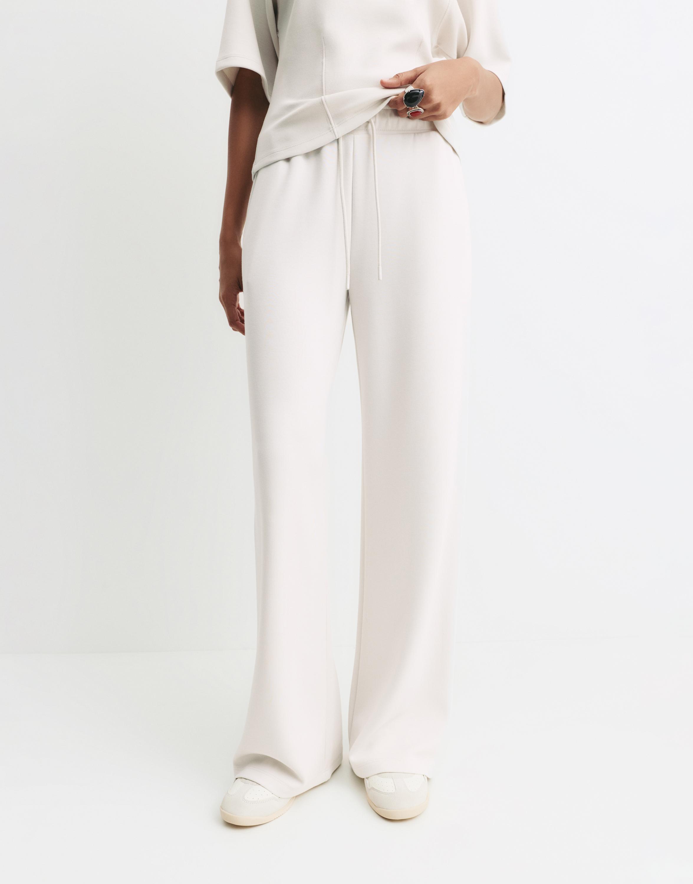 Soft-touch wide-leg trousers — Ecru