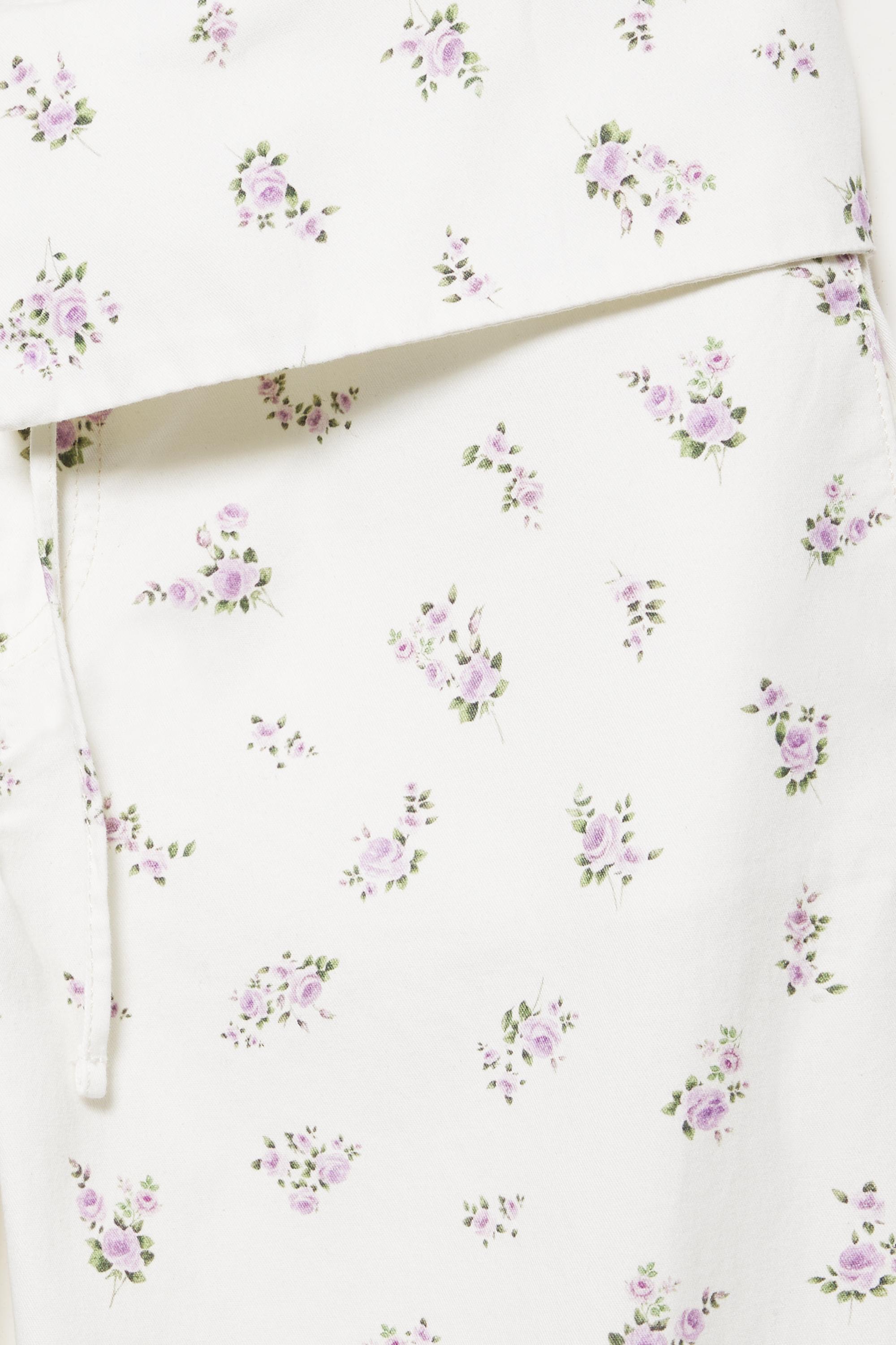 Floral trousers with turn-up waist — White