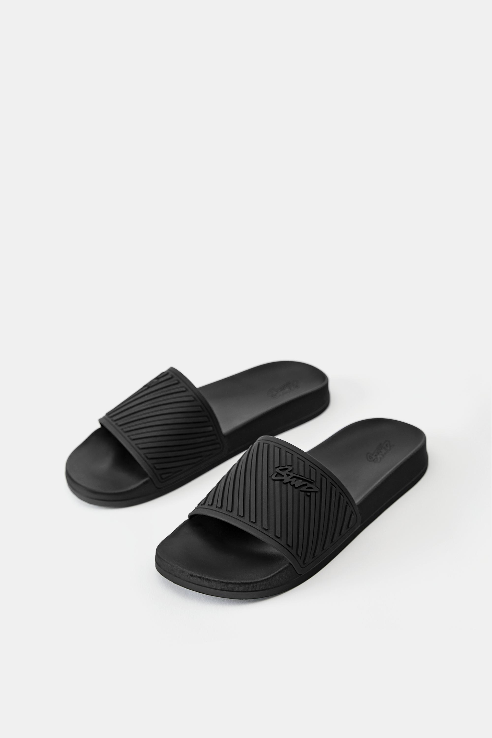 STWD rubberised sandals — Black