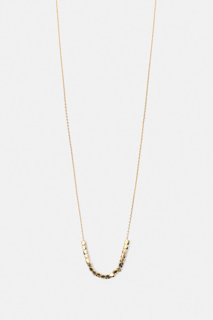 Beaded necklace — Gold