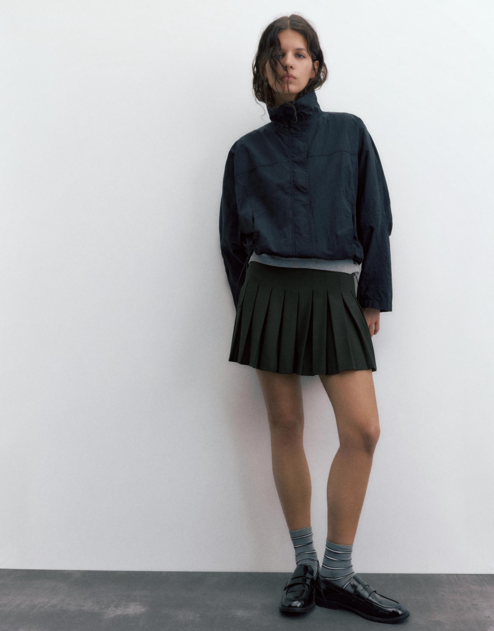 Pleated mini skirt — Black