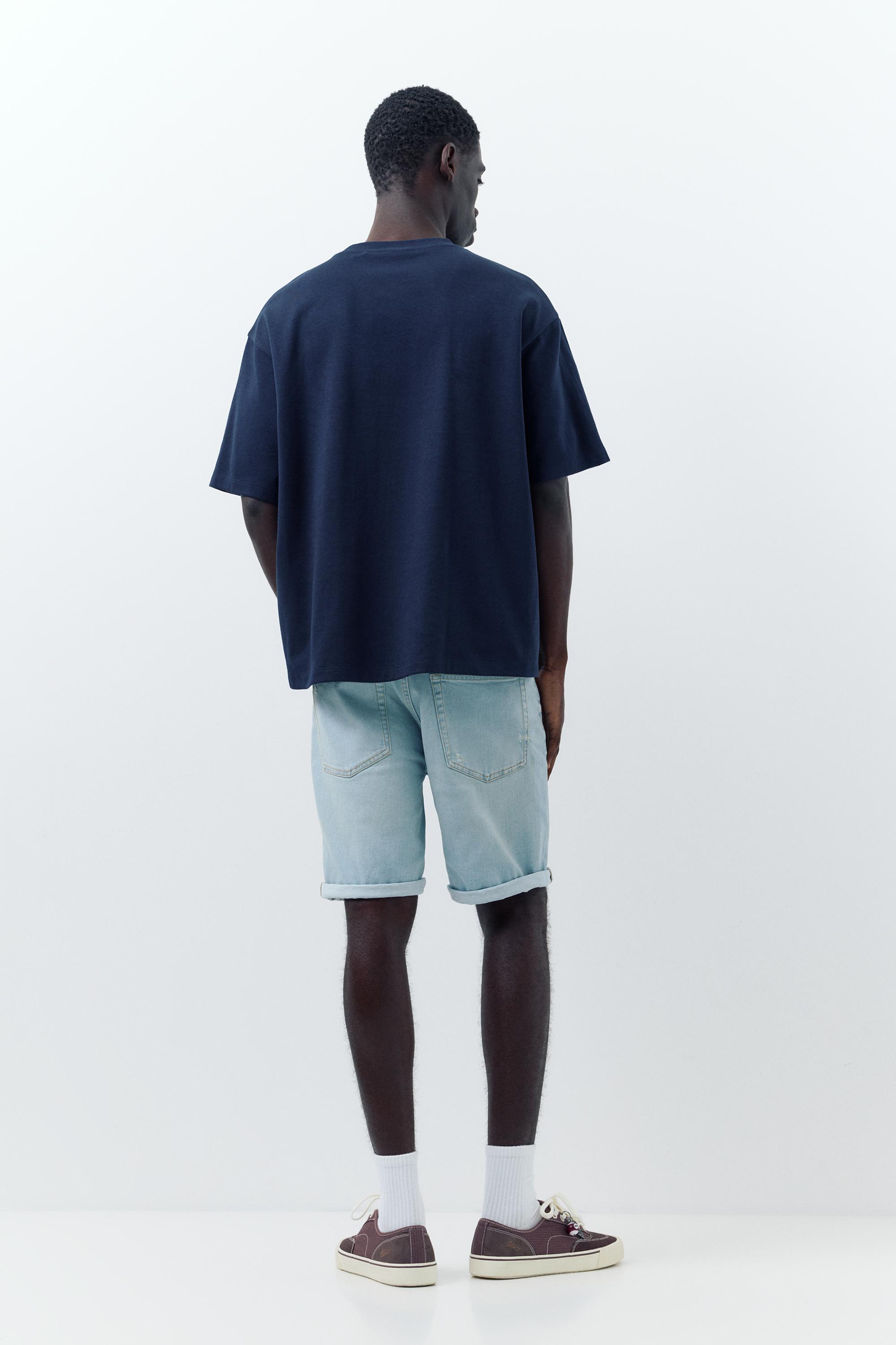 Ripped denim Bermuda shorts — Pale indigo