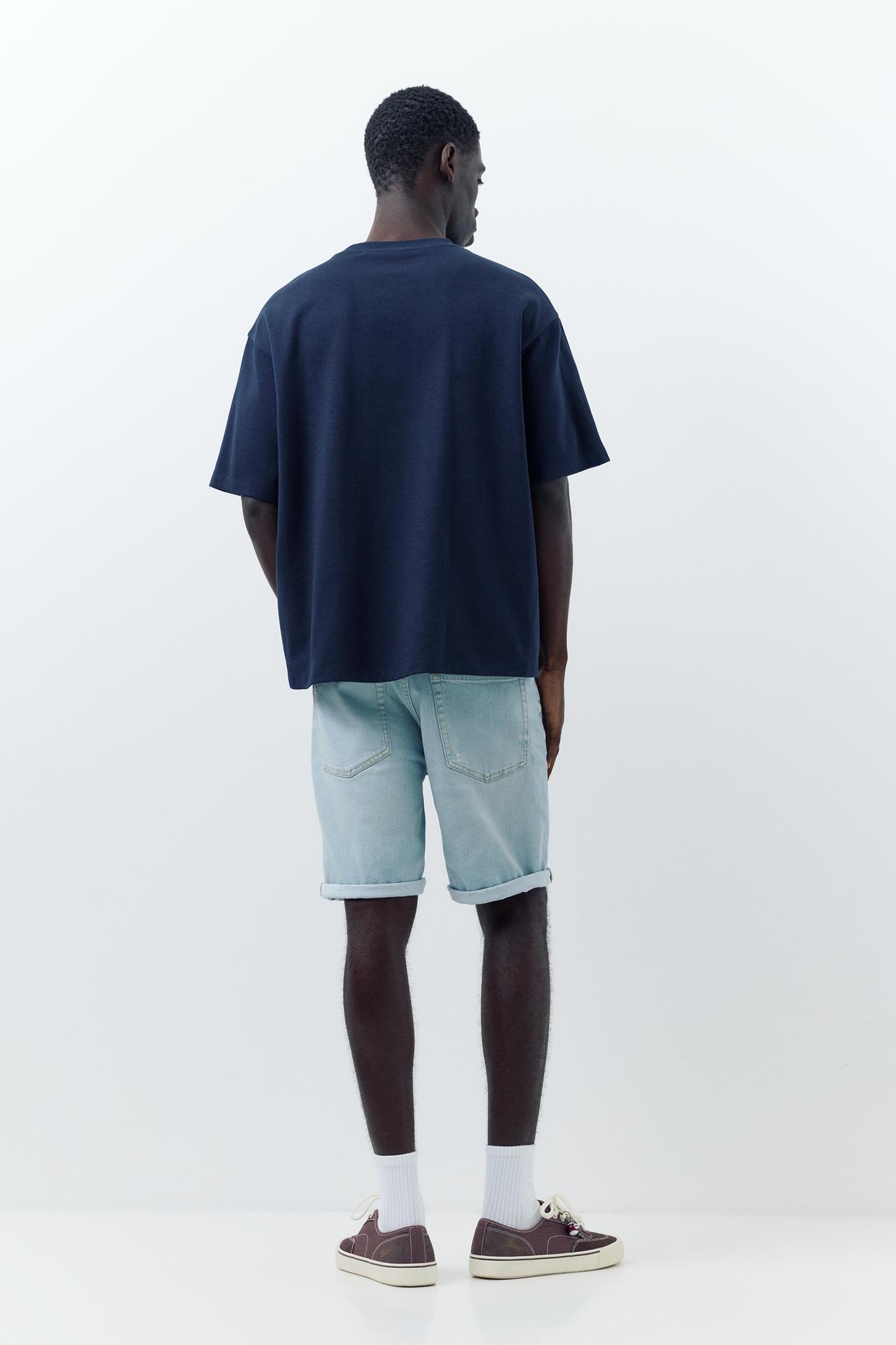 Ripped denim Bermuda shorts — Pale indigo