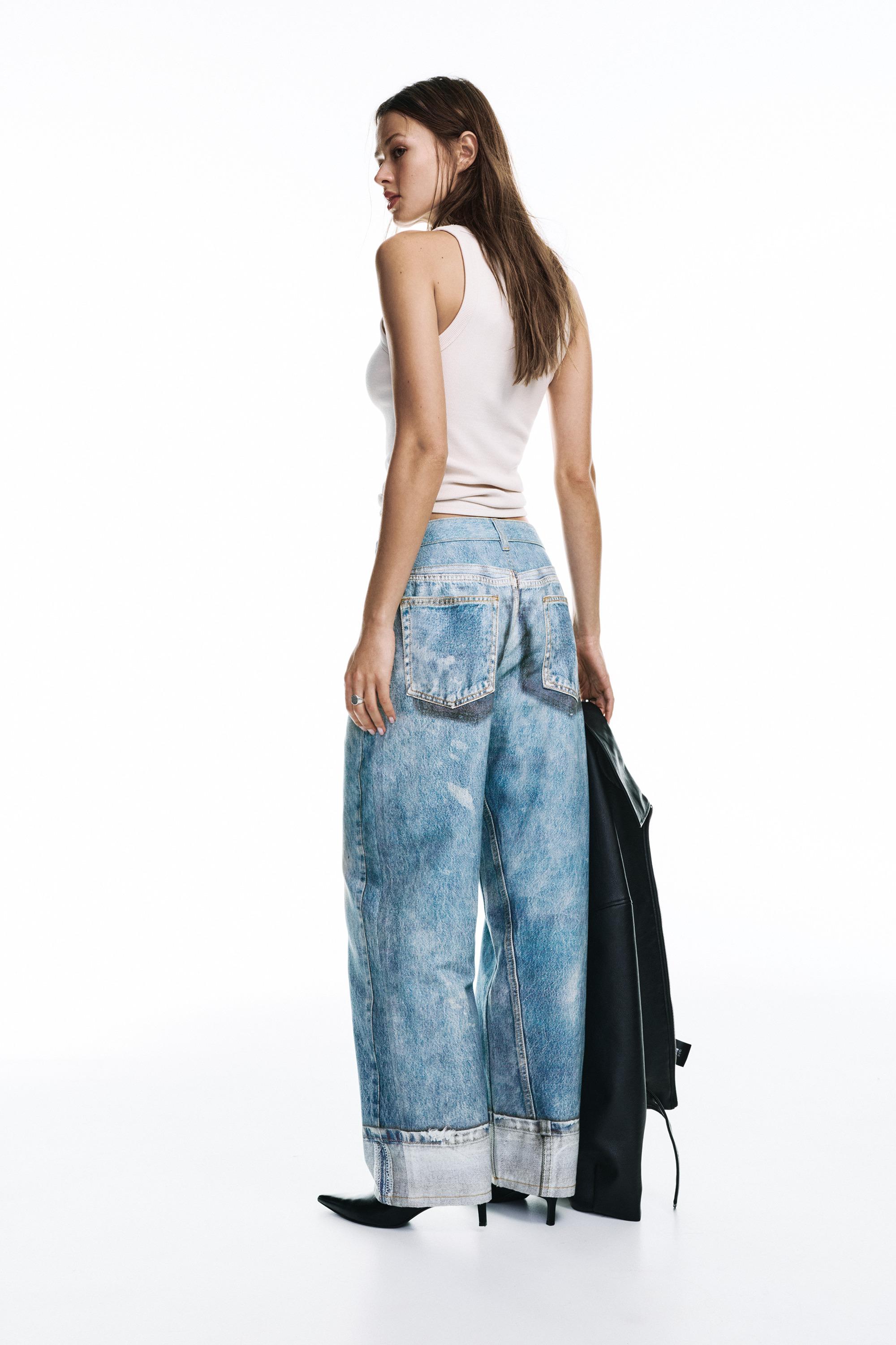 Bol paça baskılı kot pantolon