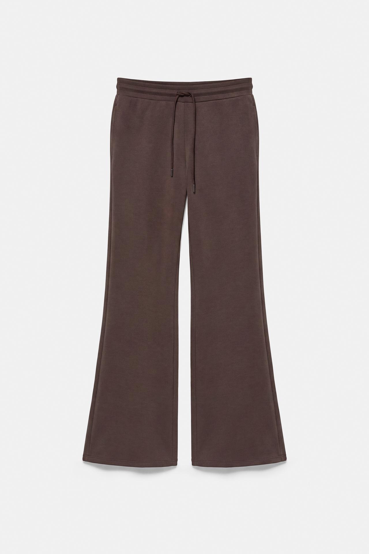 Soft-touch flared trousers — Brown