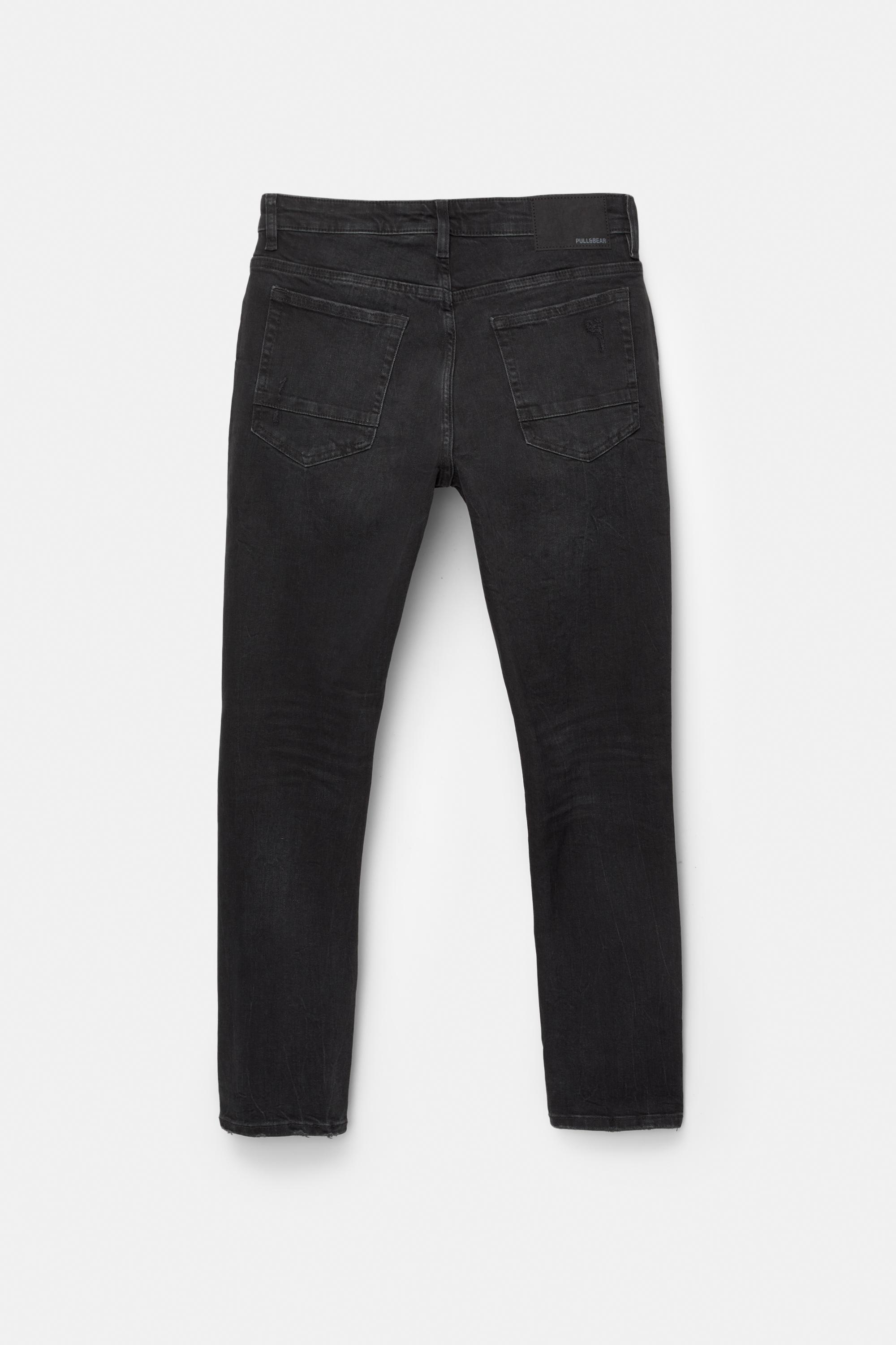 Ripped skinny jeans — Faded black