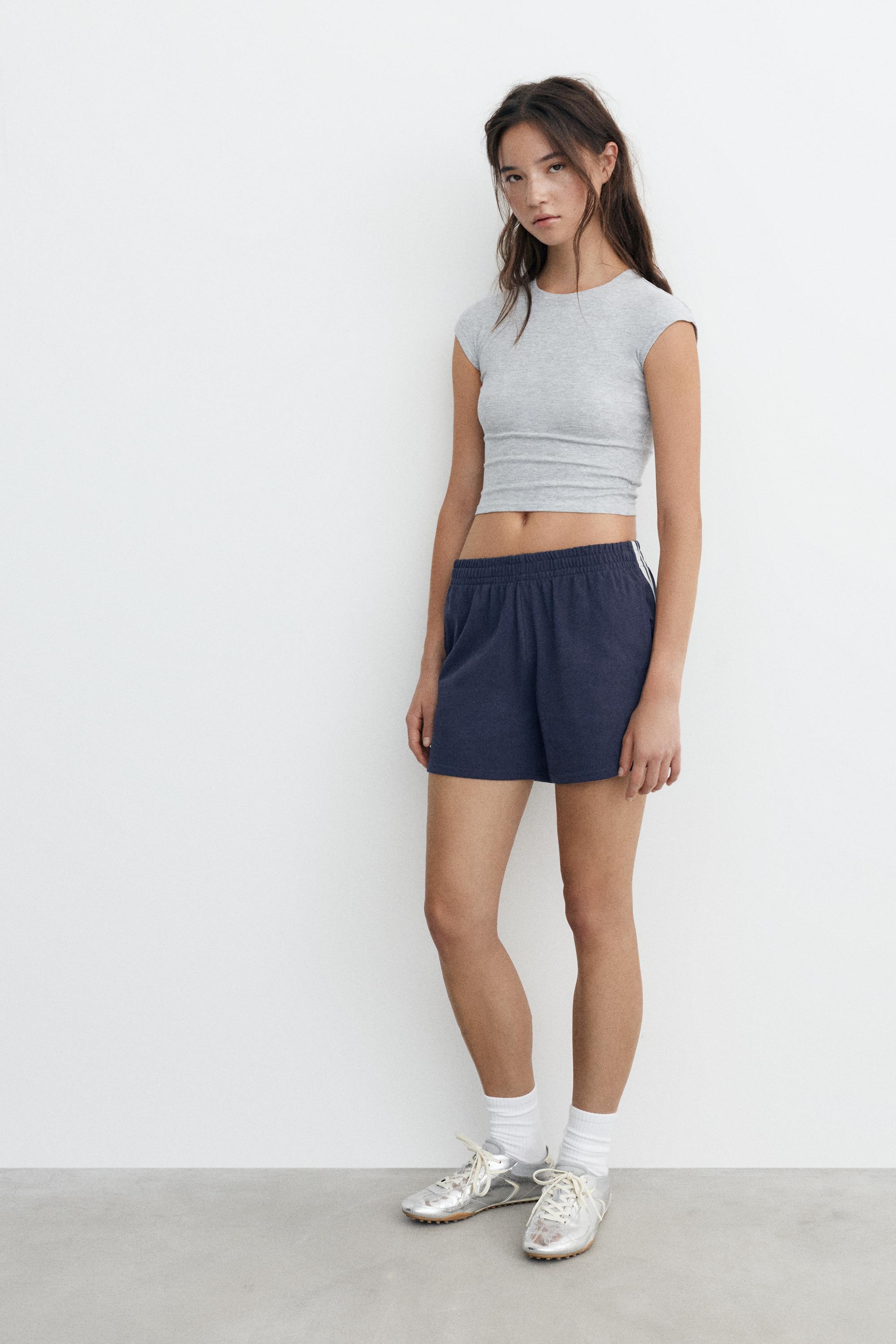 Sports shorts with side stripes — Dark navy