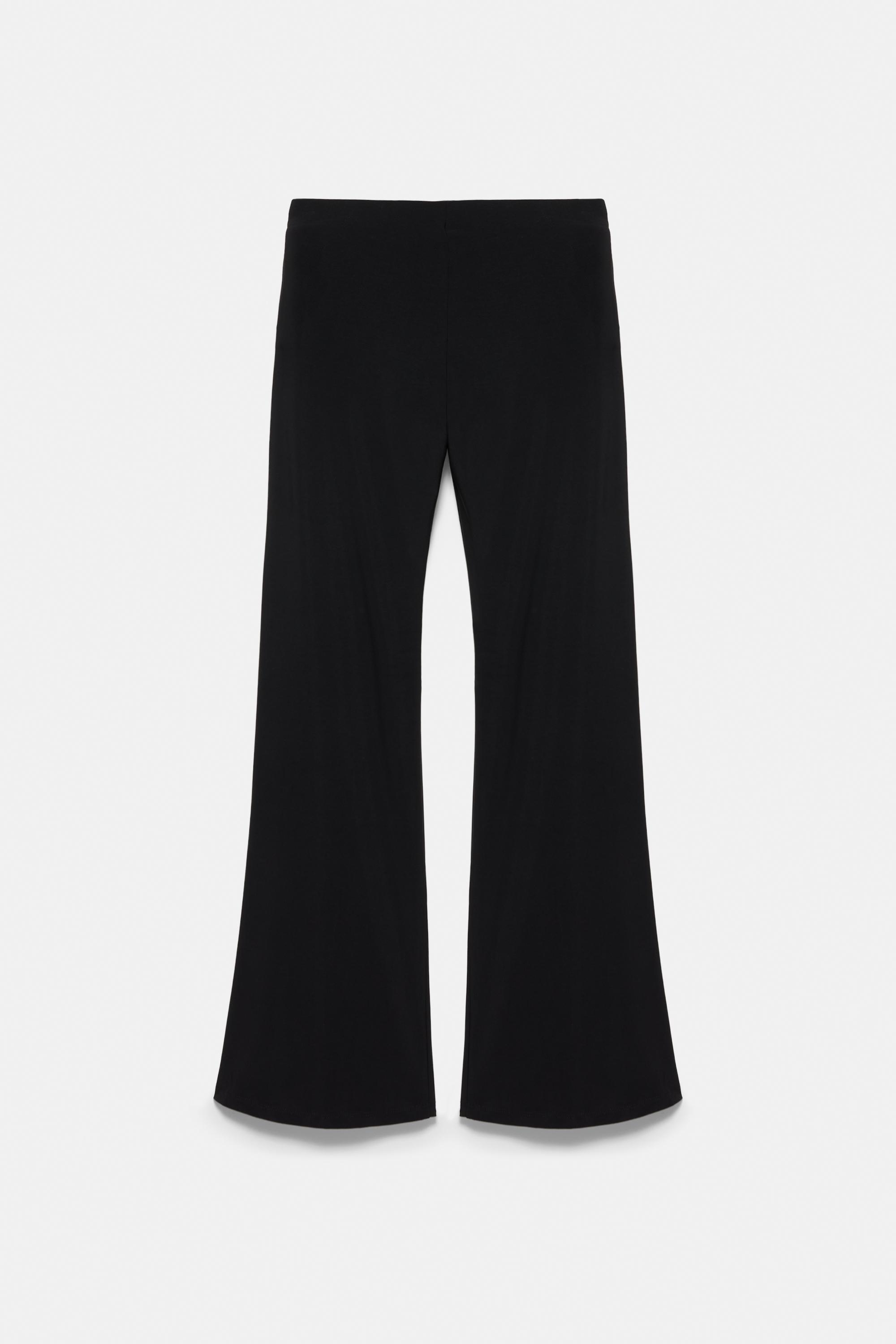 Black flared trousers — Black