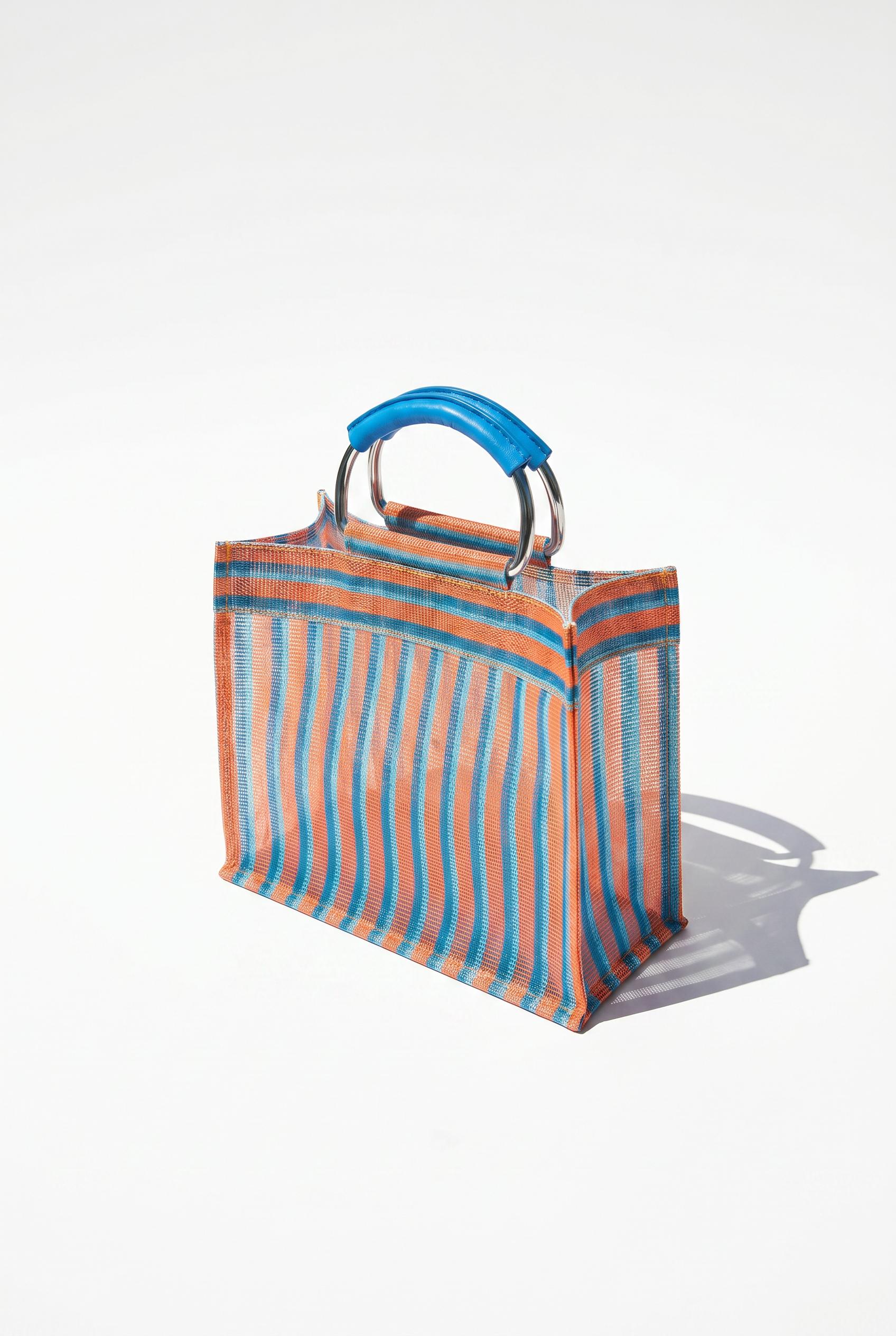 Striped handbag — Orange