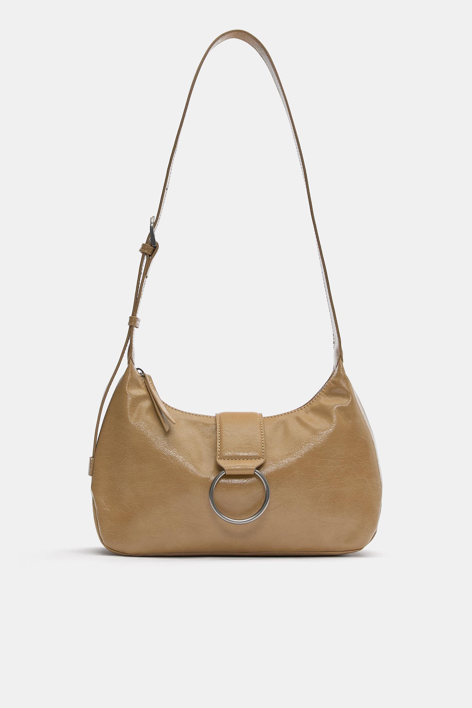 Crossbody bag with buckle — Leather